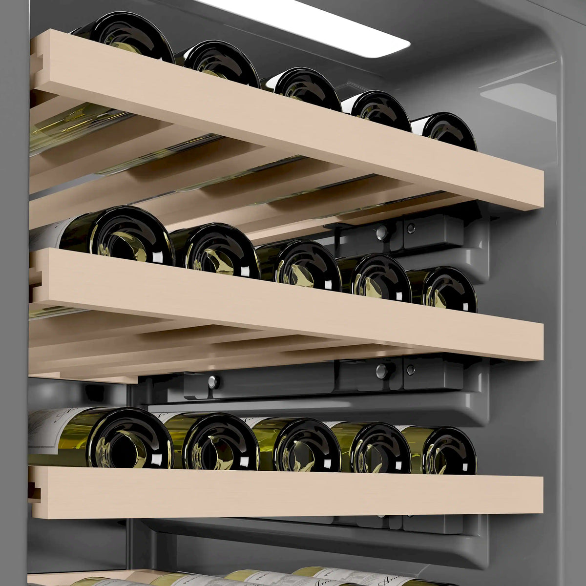 Wine cooler interior with sliding bottle shelves and wine bottles on multiple rack levels