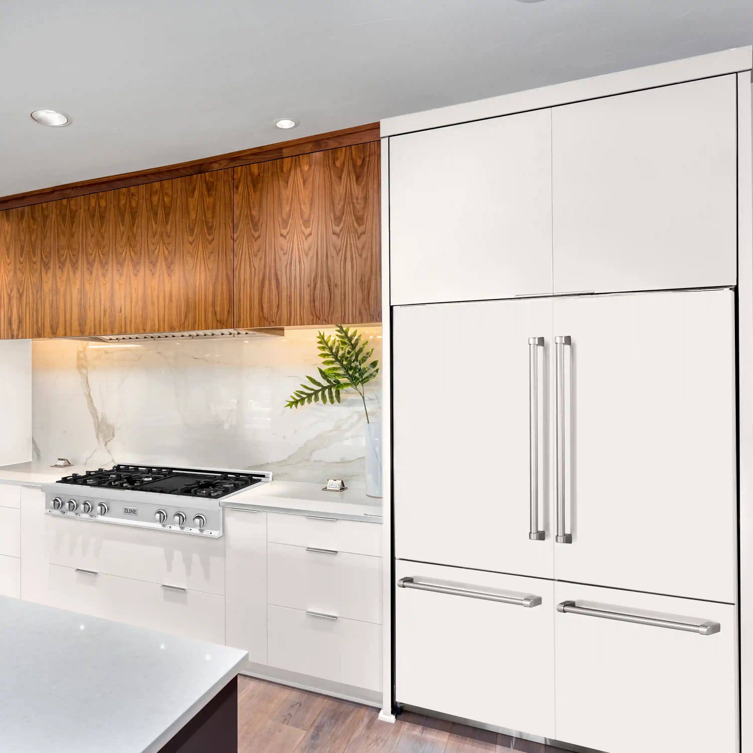 White built-in French door refrigerator with vertical bar handles