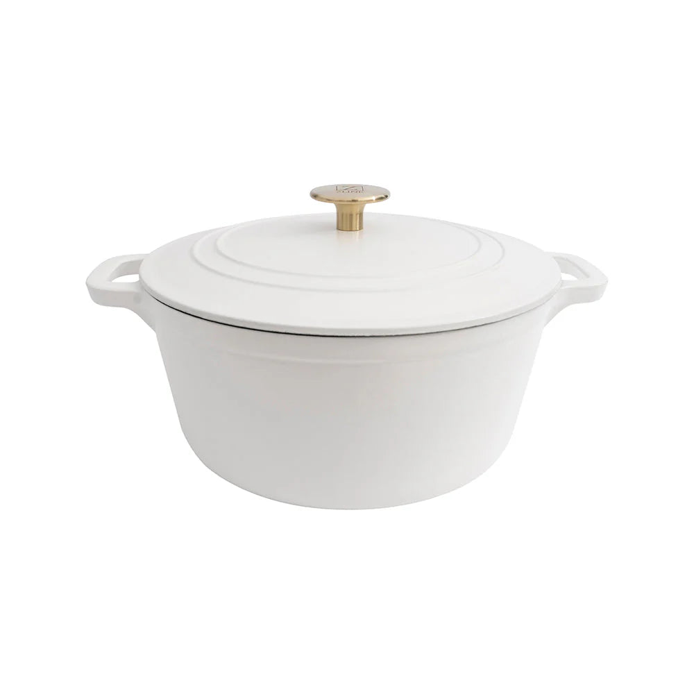 White matte enameled cast iron covered pot with gold knob and side handles