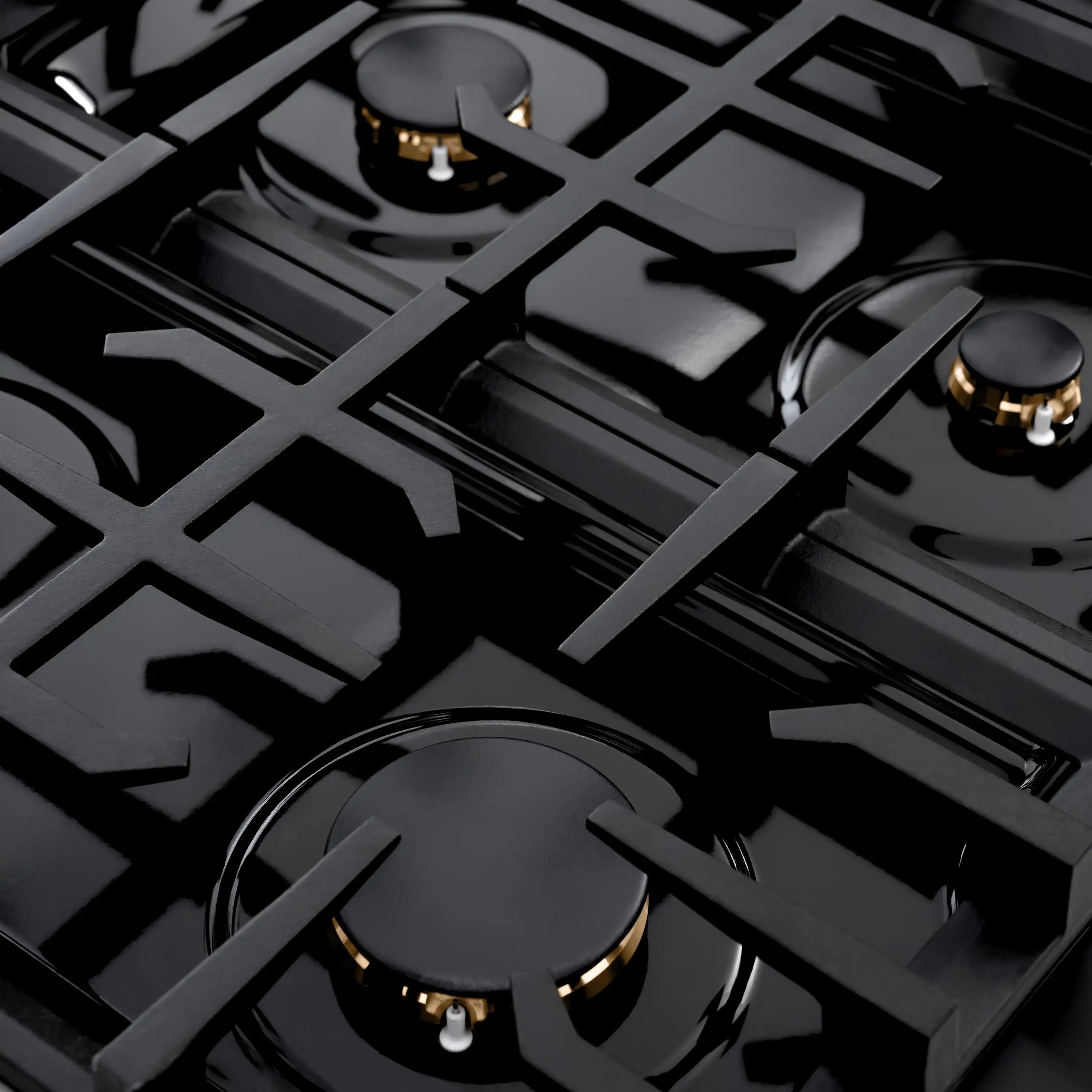 Gas range cooktop with black grates and brass-colored burners