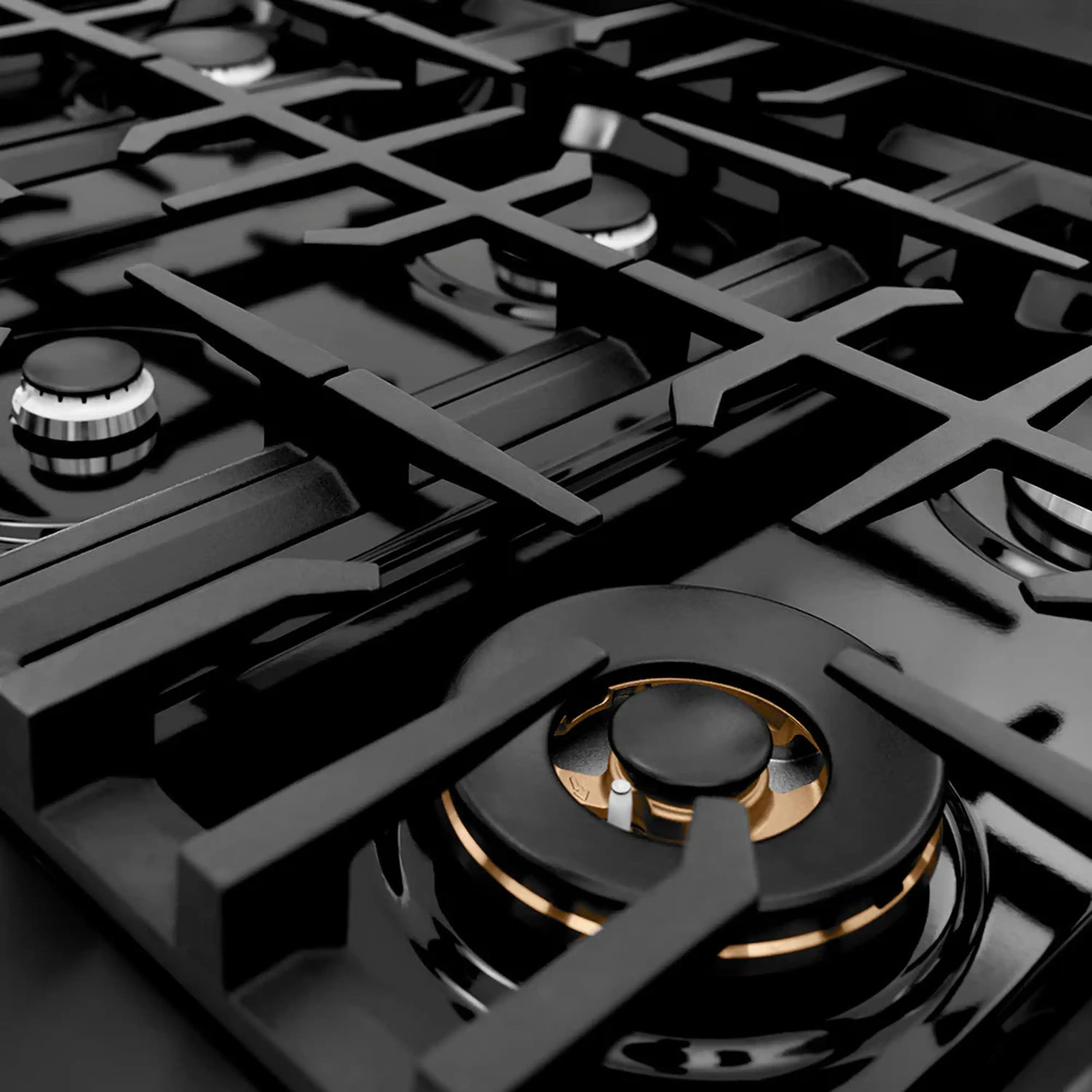 Black stainless gas rangetop with multiple burners and grates, front corner view
