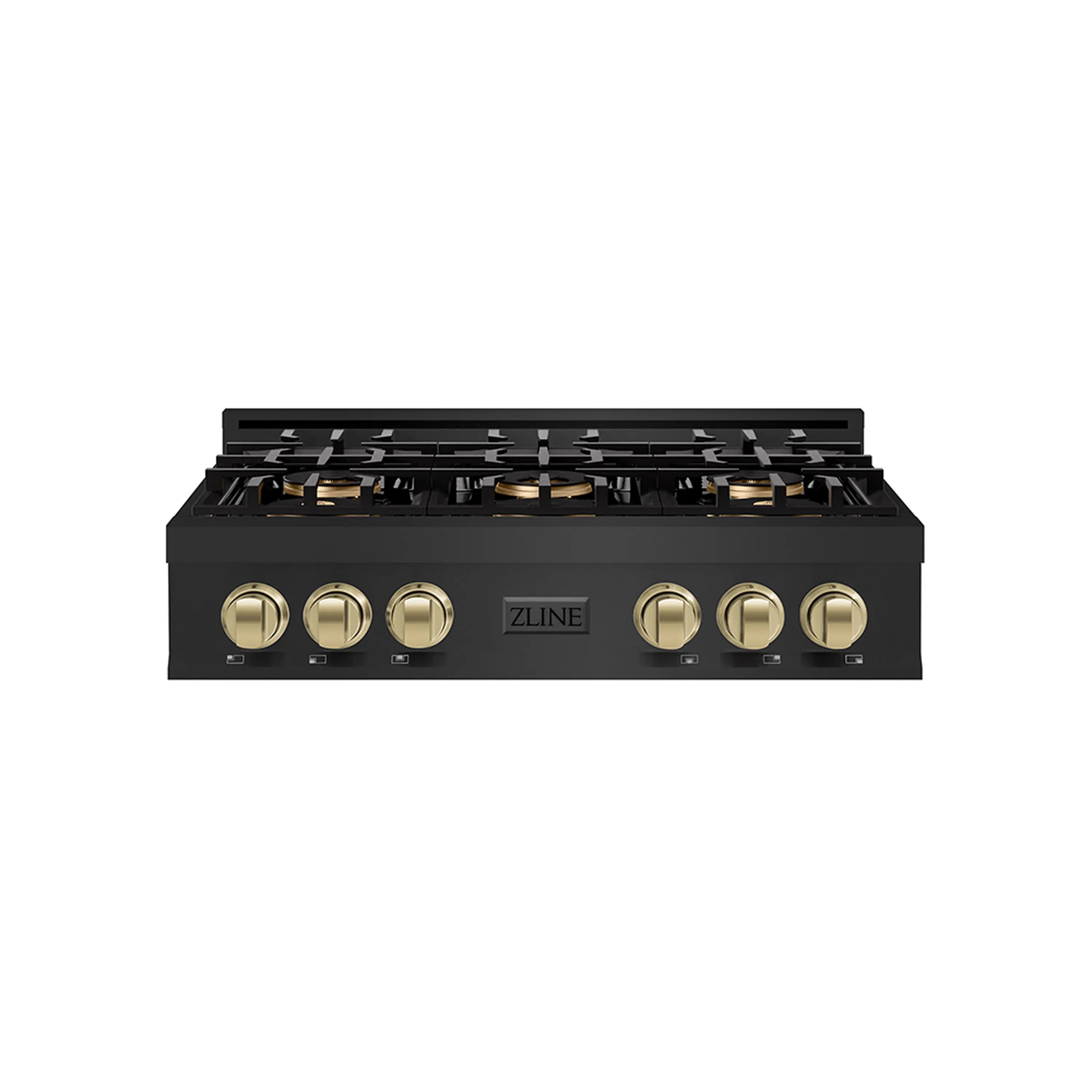 Black gas rangetop front panel with champagne-bronze control knobs and burner grates.