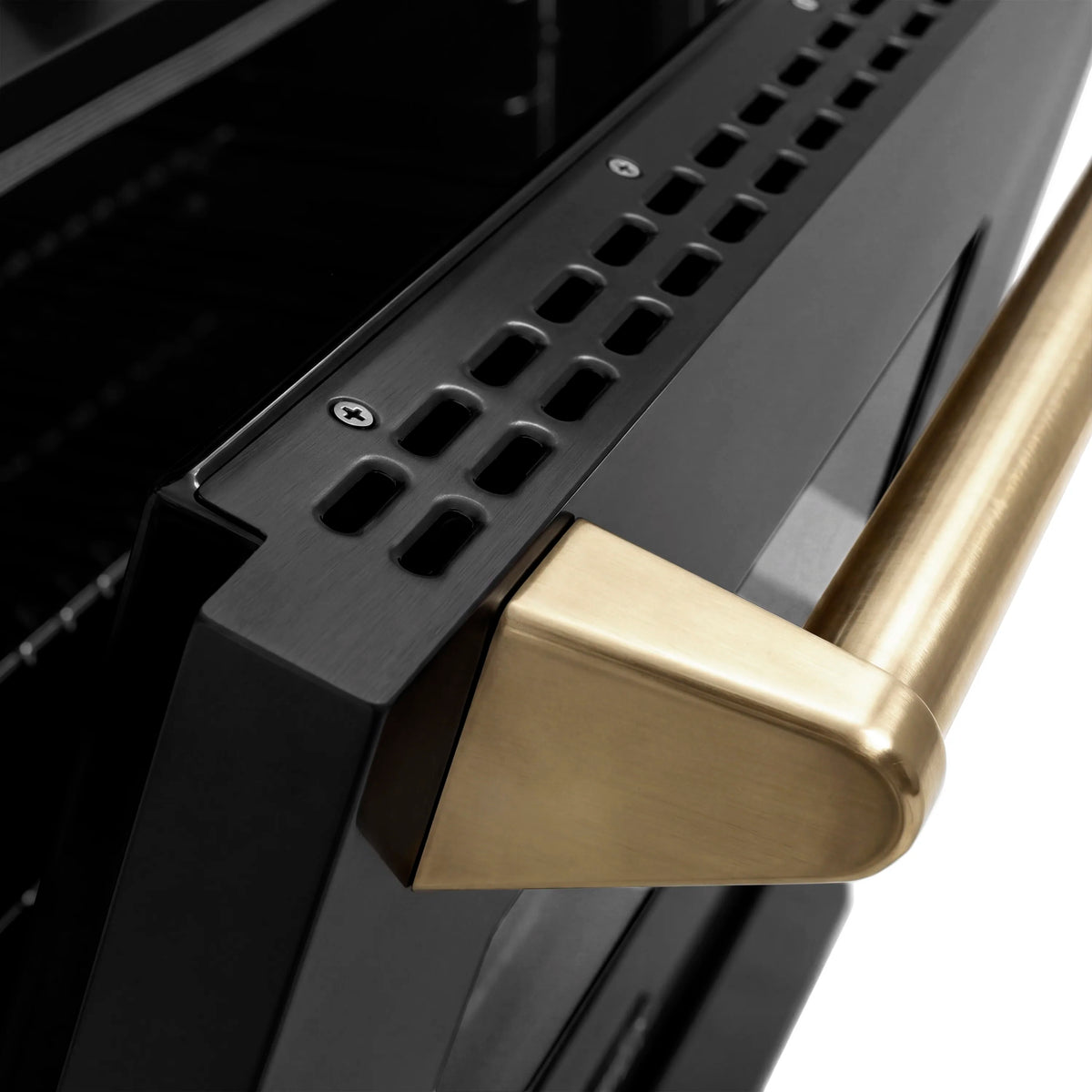 Black and champagne range handle with vented side panel detail
