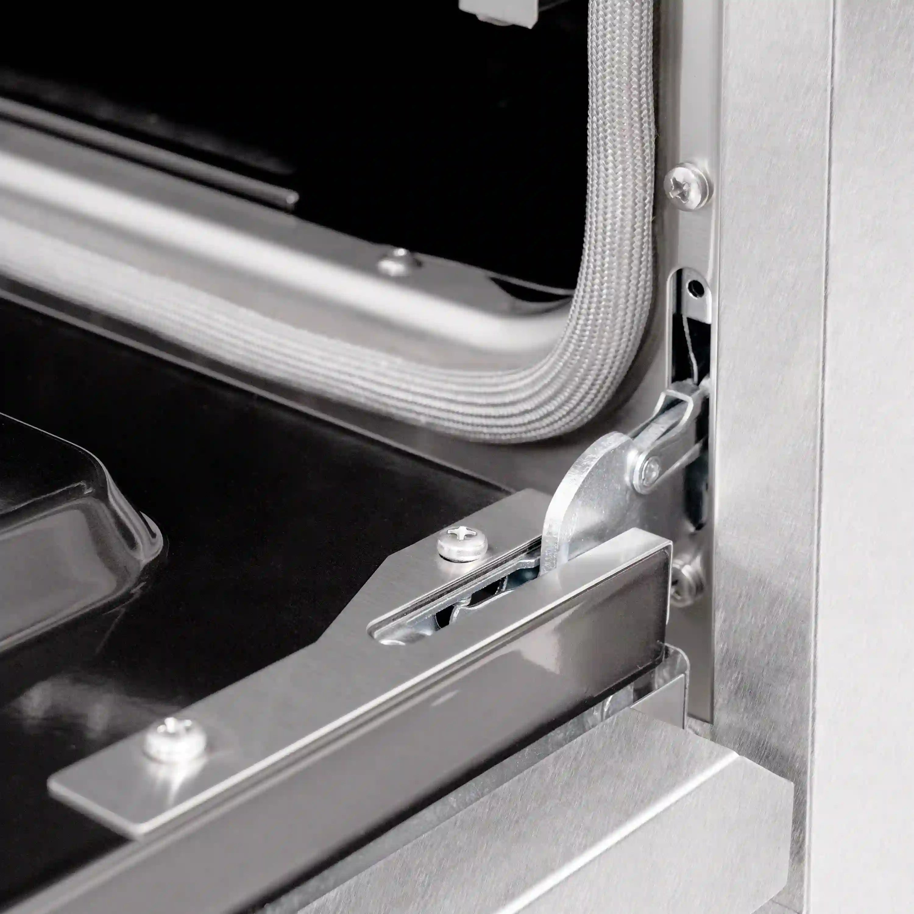 Convection oven door hinge and slide rail hardware in satin stainless steel