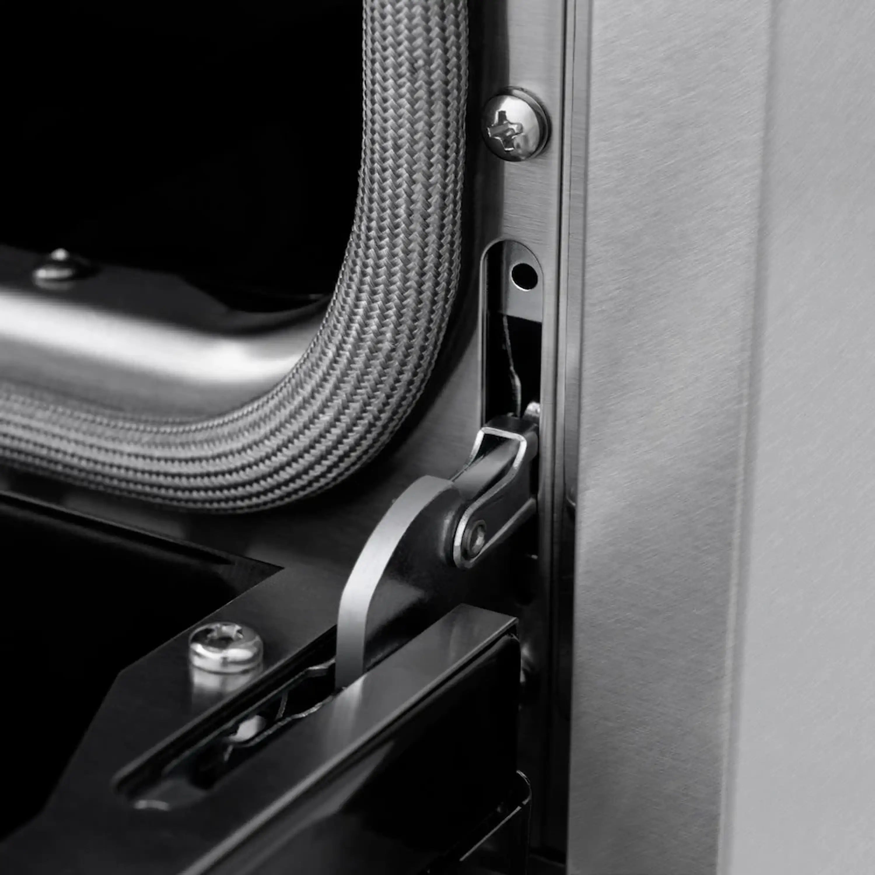Satin stainless steel range door latch and handle with black control panel trim