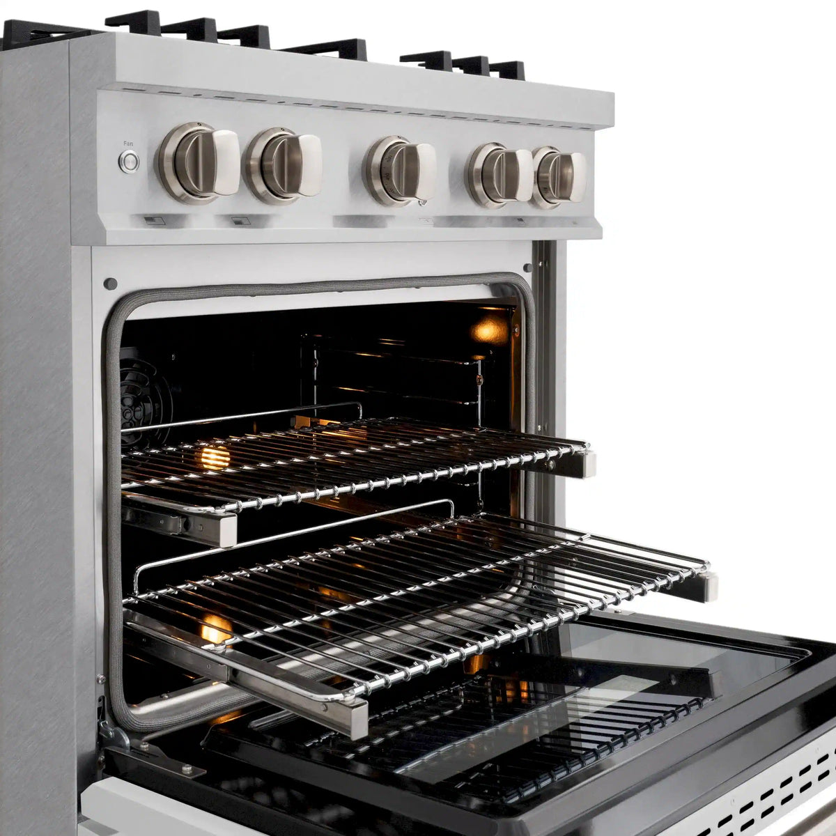 Dual fuel range oven interior with glowing elements and wire racks