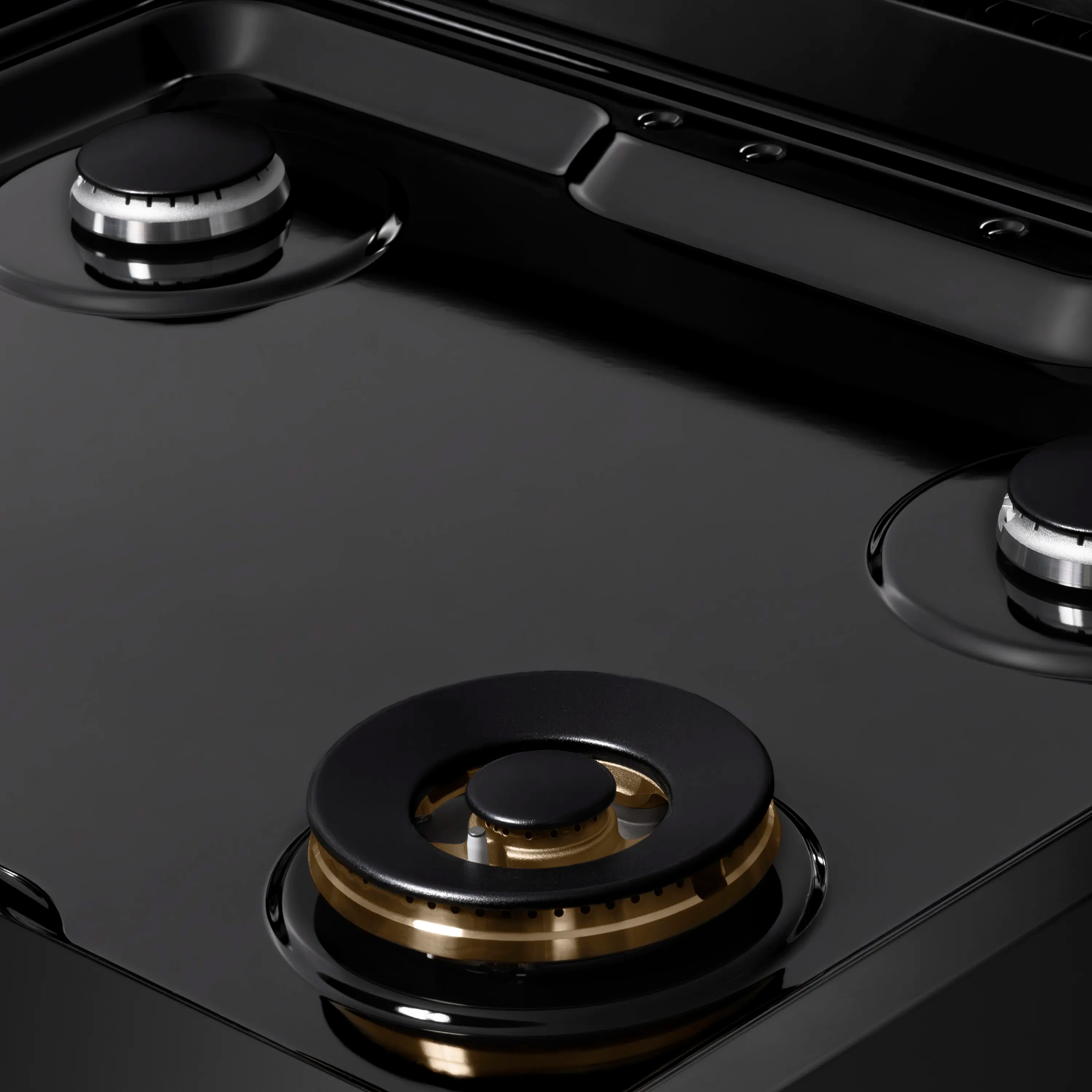 Black porcelain cooktop with two burners and round black burner caps