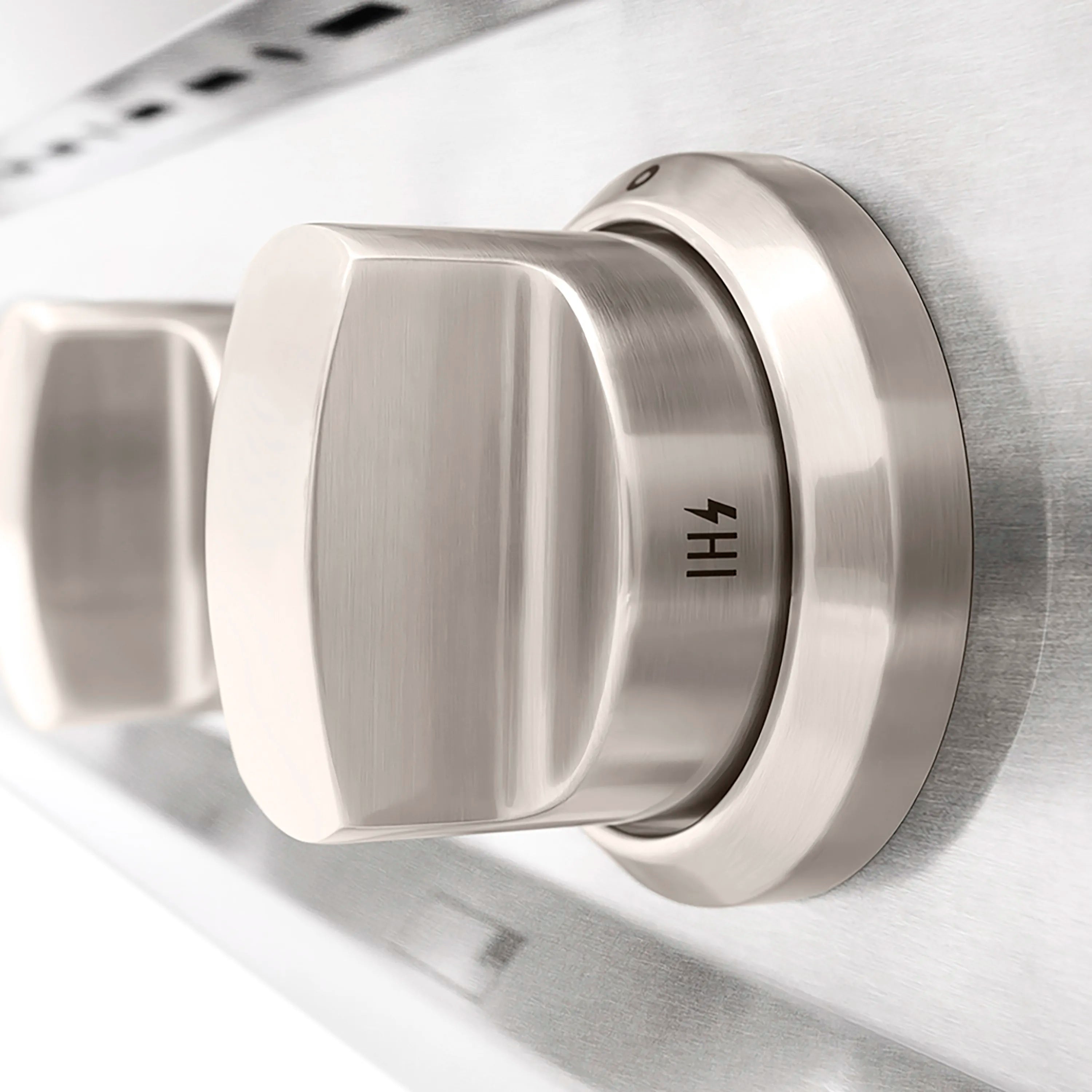 Stainless steel control knob with HI marking on brushed metal gas stovetop