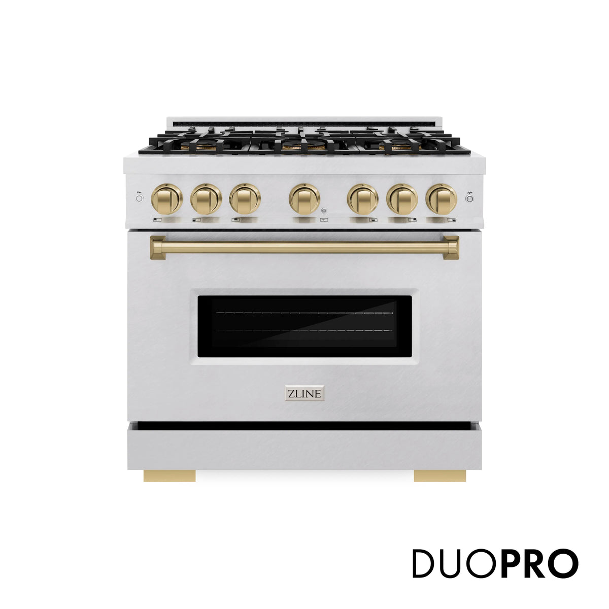 Satin stainless dual fuel range front with gold knobs, brass handle, and black oven door