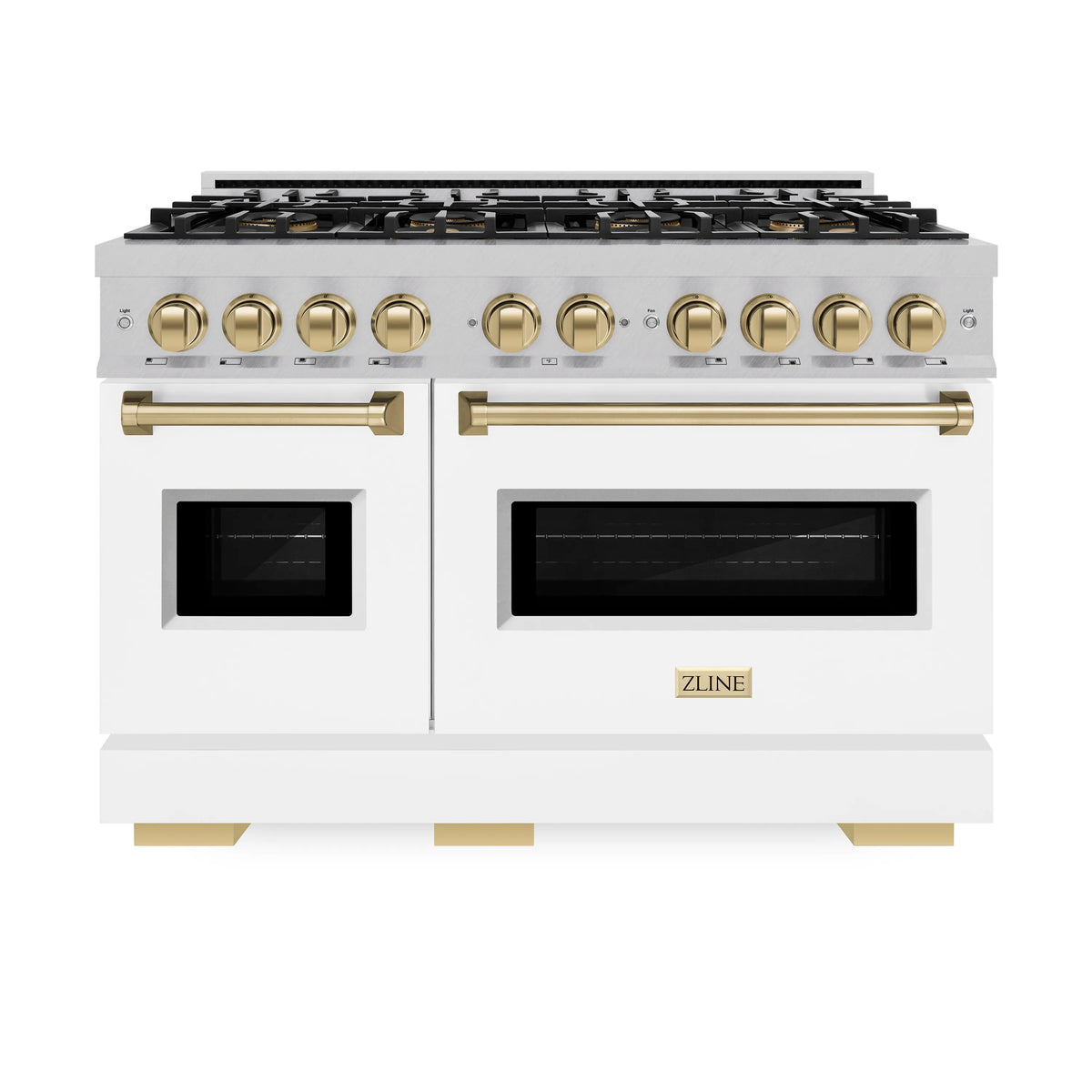 Front view of a white dual fuel range with black cooktop grates, gold knobs, two ovens, bronze handles