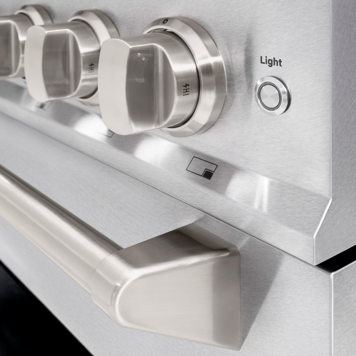 Satin stainless control panel with Light label and burner knob switches