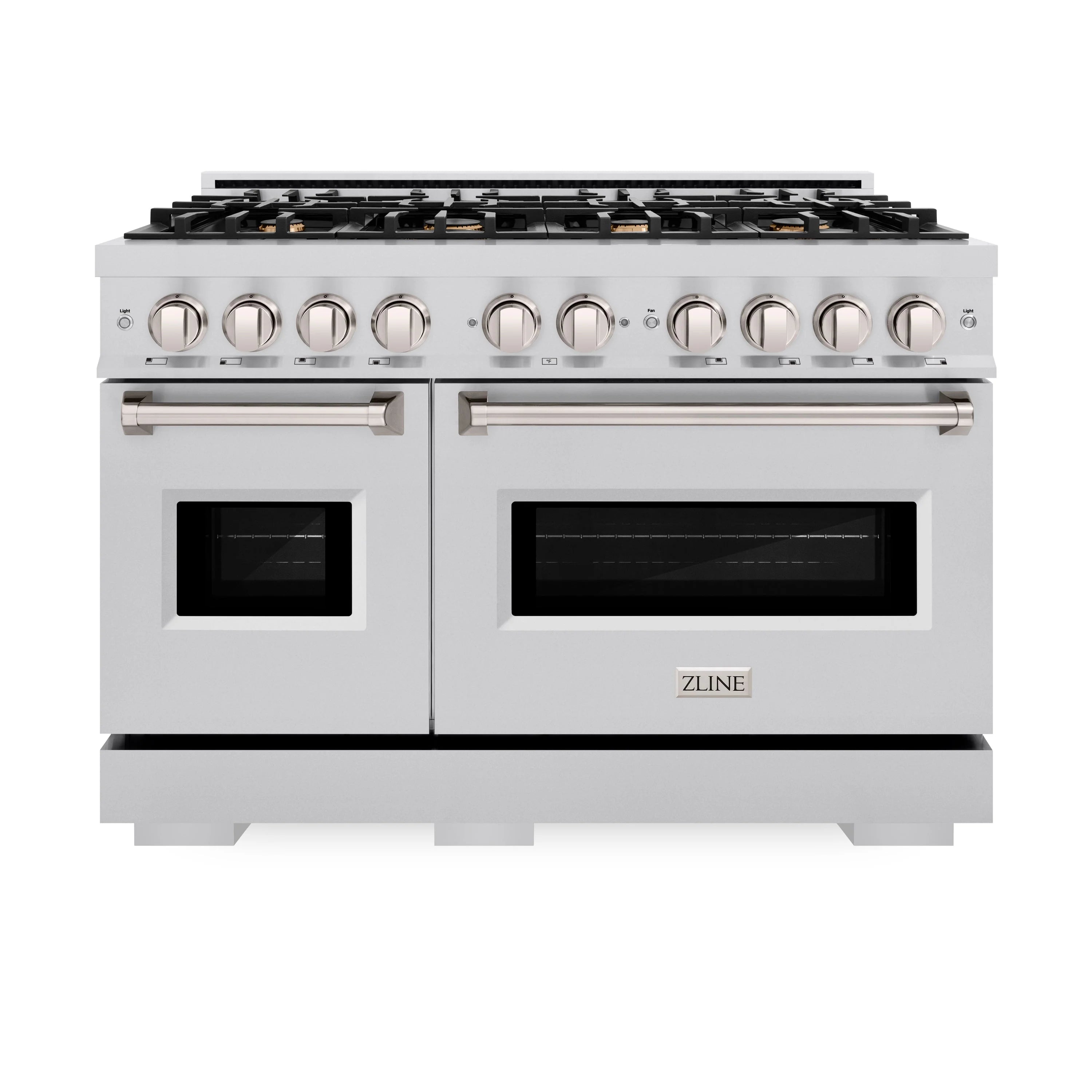 Stainless dual fuel range with brass-accent knobs, two oven doors, and black grates