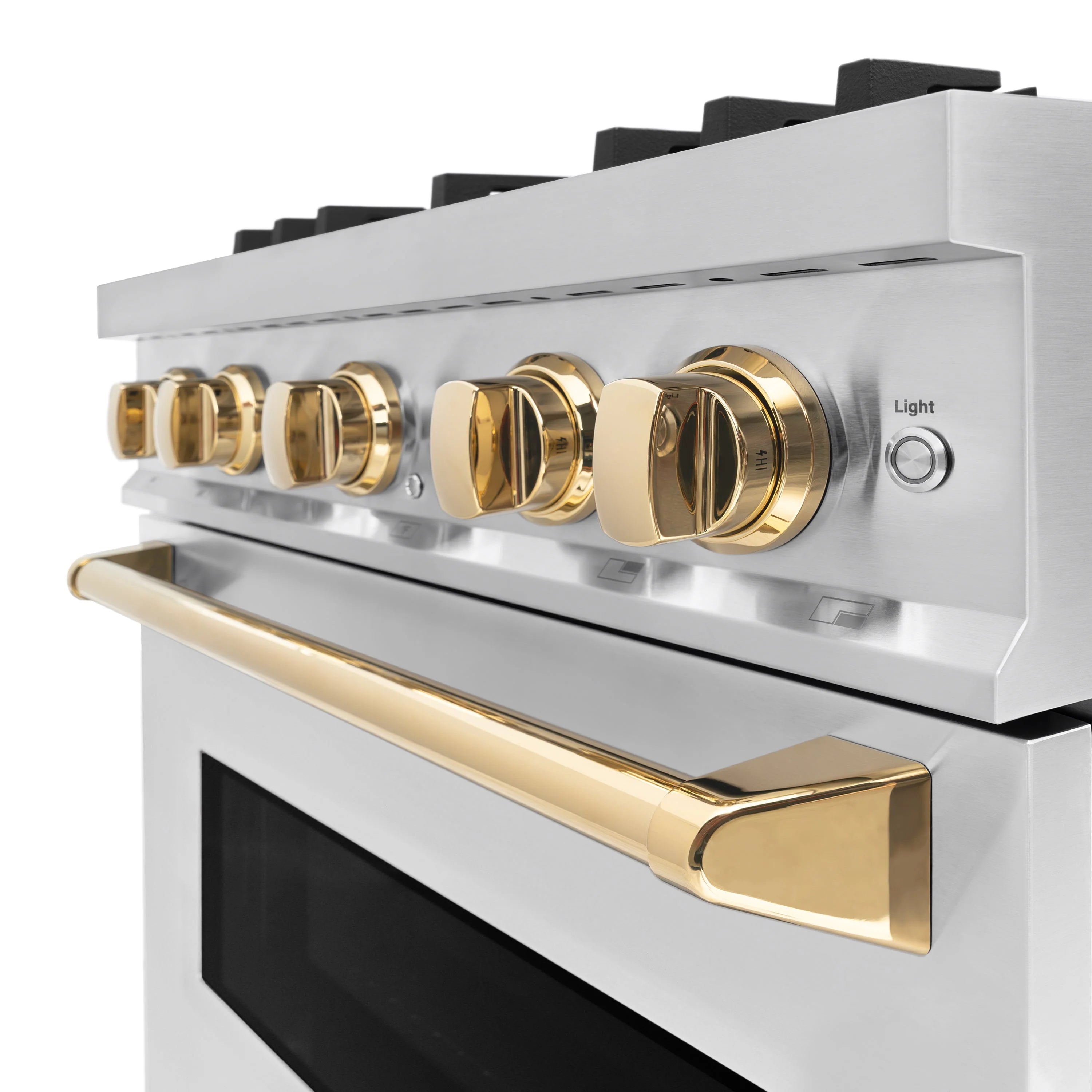 Stainless steel range control panel with four polished gold knobs and light button