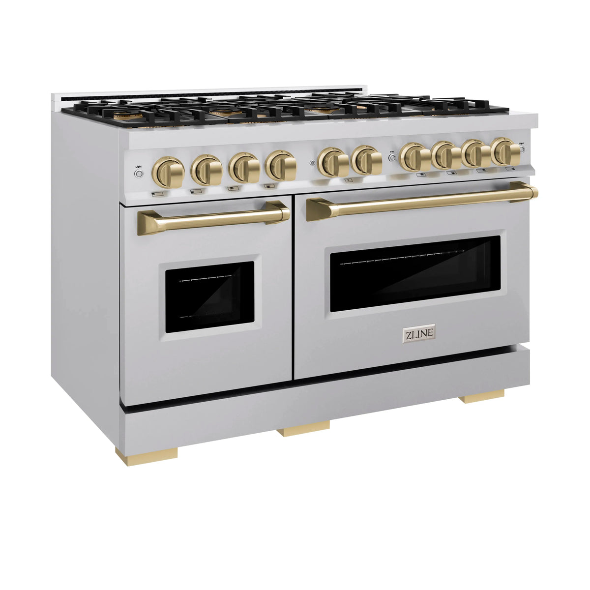 Dual fuel range with white body, gold knobs, and two oven doors with black glass