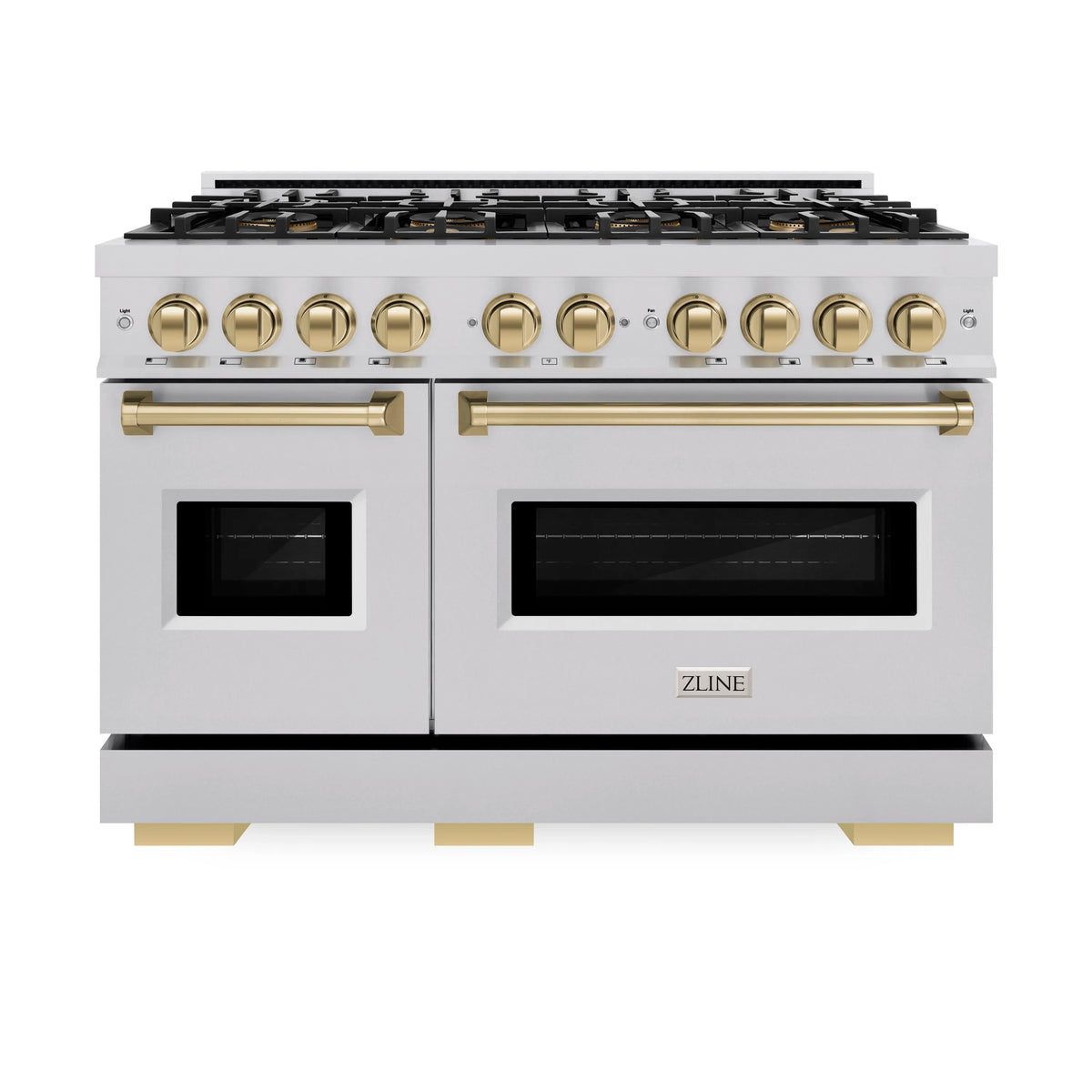 Dual fuel range with white finish, gold knobs, dual oven doors, and black cooktop