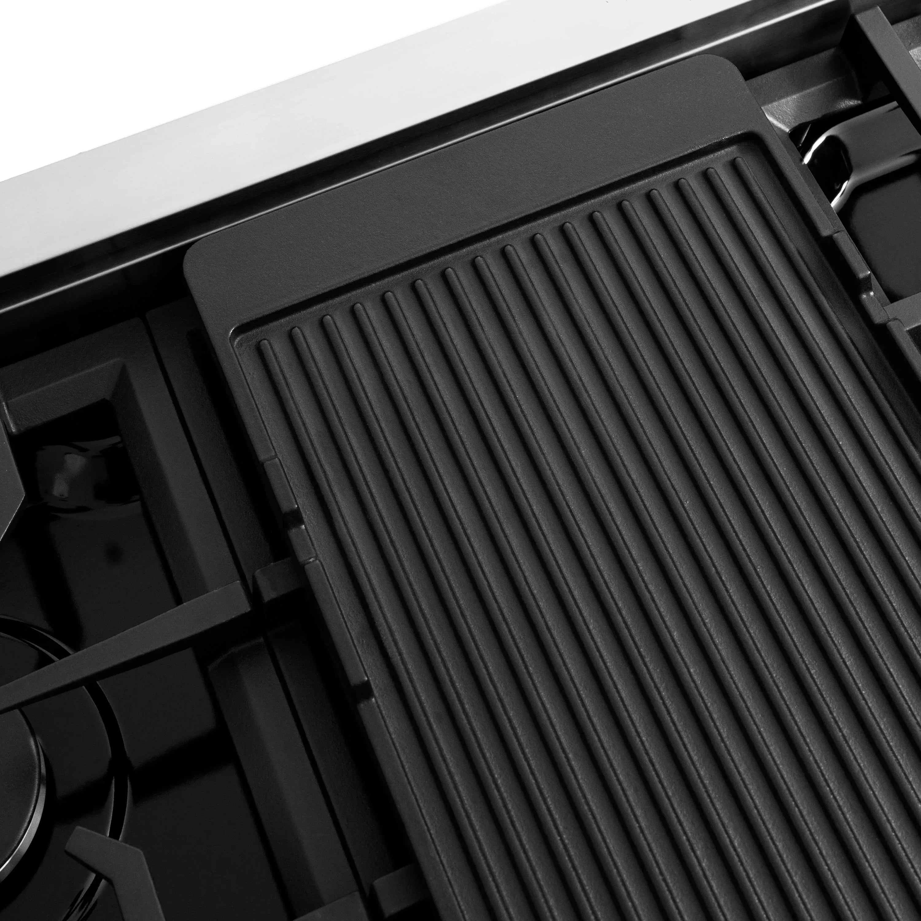 Range hood vent grille with vertical slots in a dark housing
