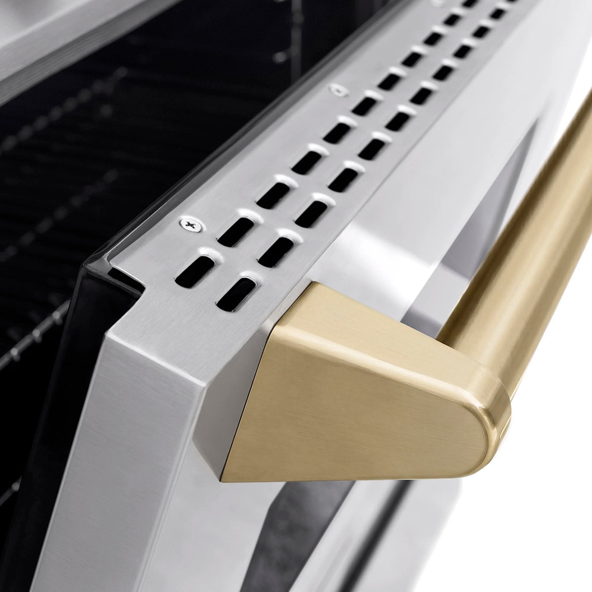 Oven door handle with Champagne Bronze accent and vented grille across opening