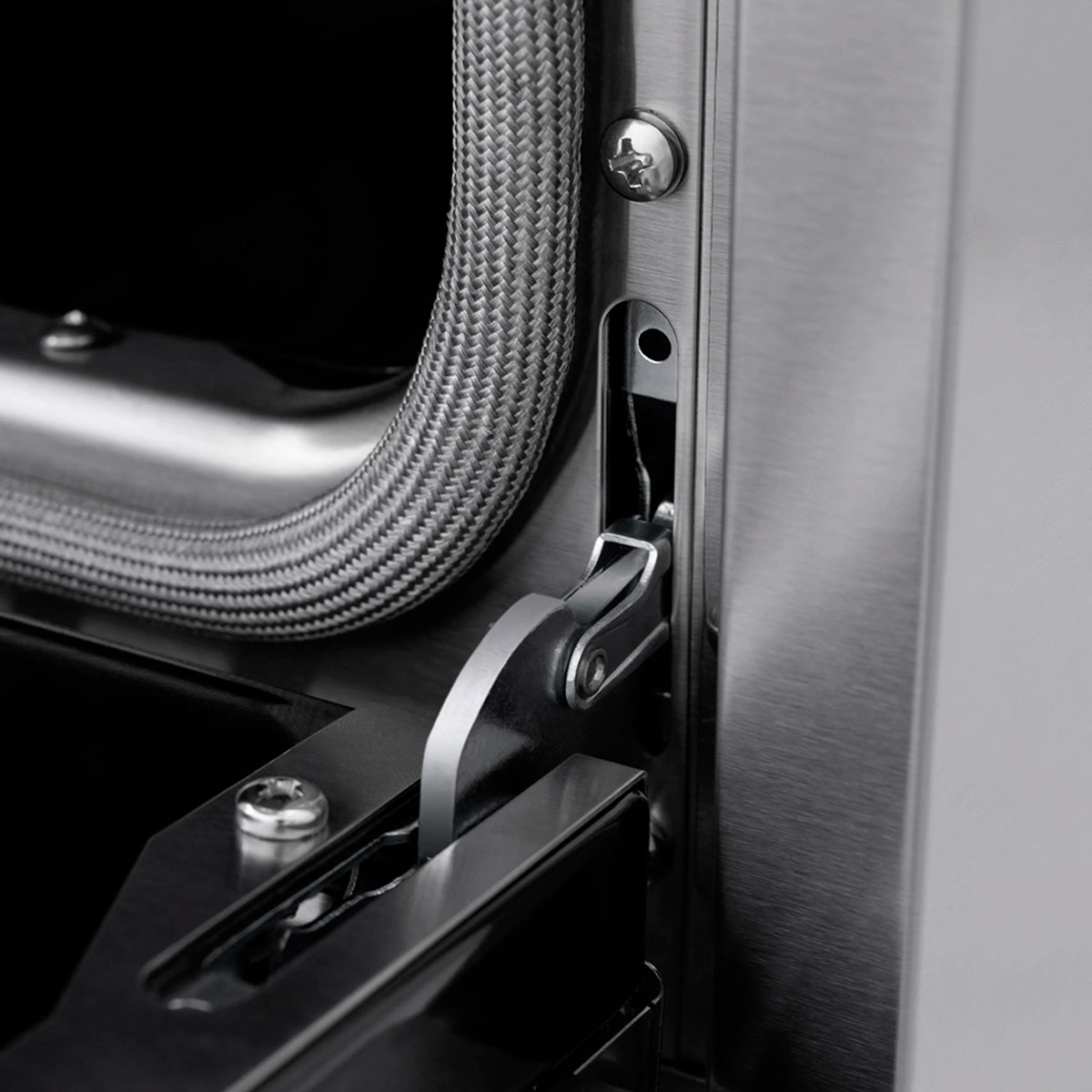 Stainless oven side hinge with connected flexible gas line and metal latch