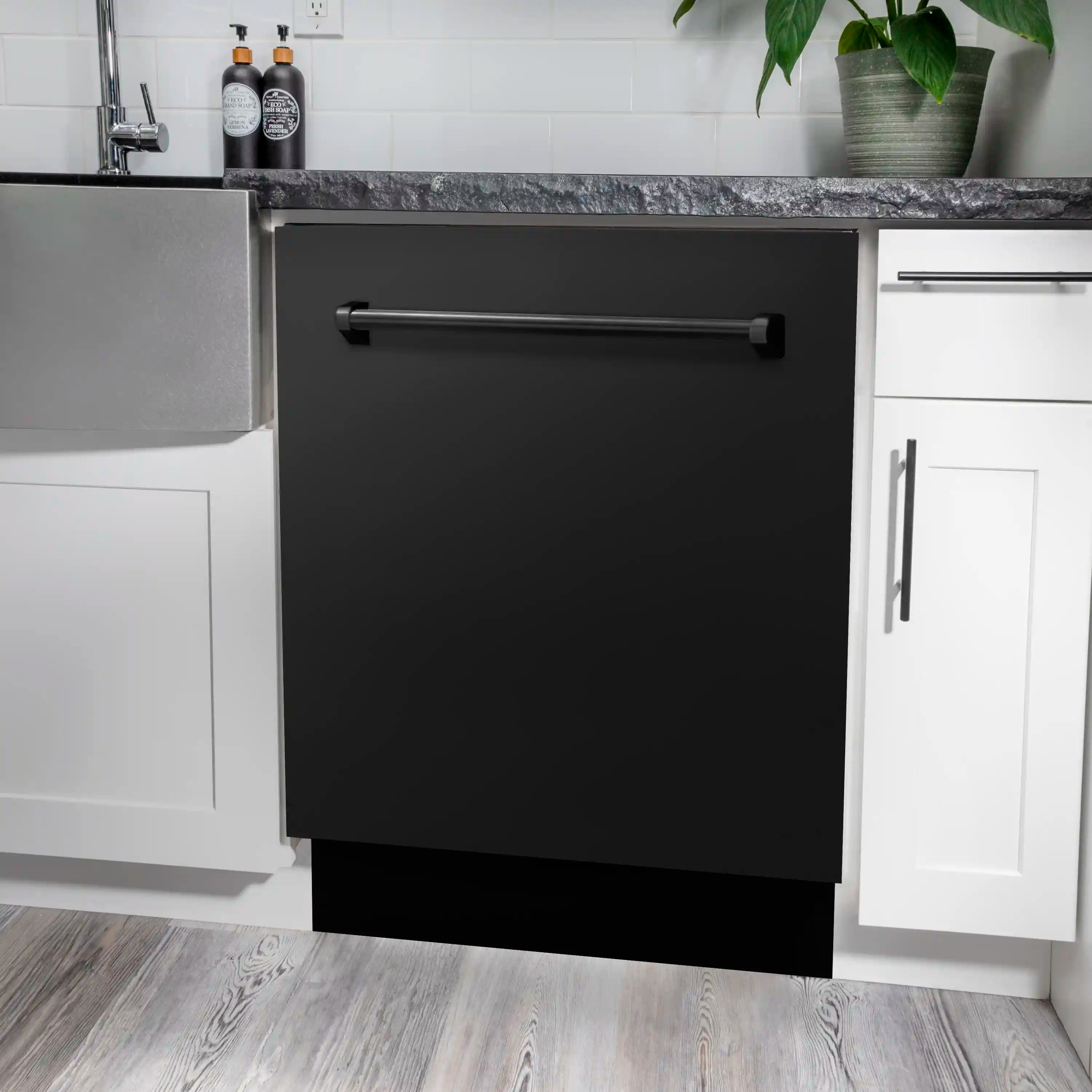 Black microwave drawer front with bar handle under countertop