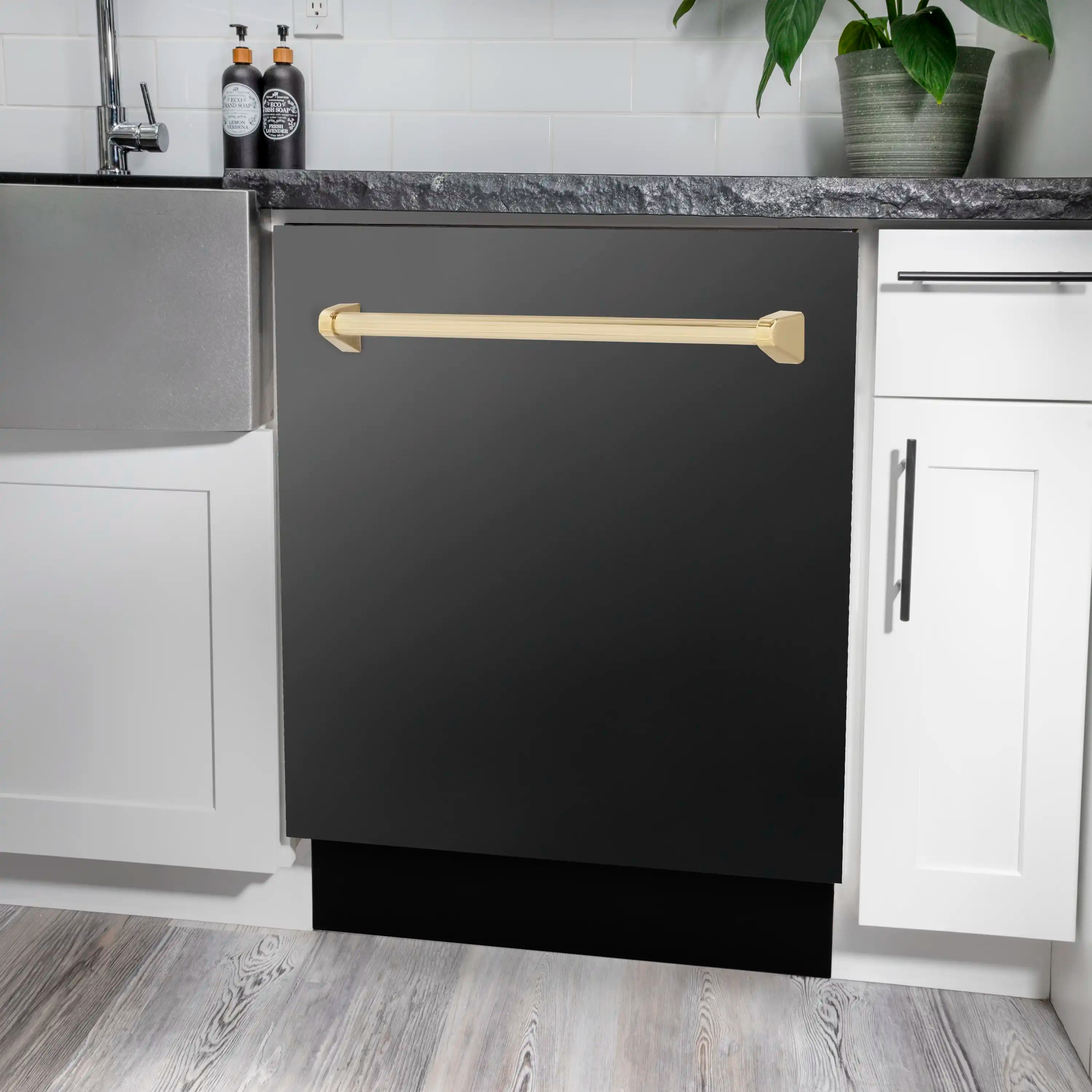 Built-in black stainless dishwasher with gold bar handle