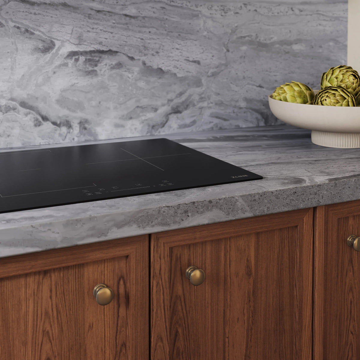 Black built-in induction cooktop with flush anti-scratch glass and touch controls