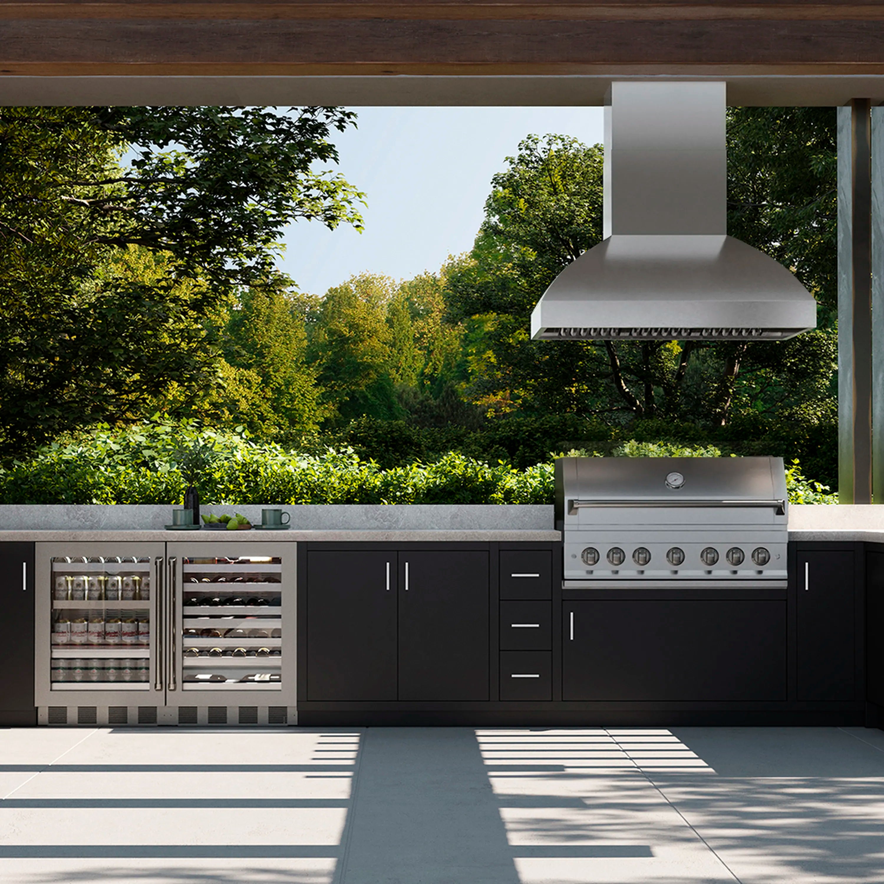 Stainless steel island grill hood above outdoor grill with flat canopy.