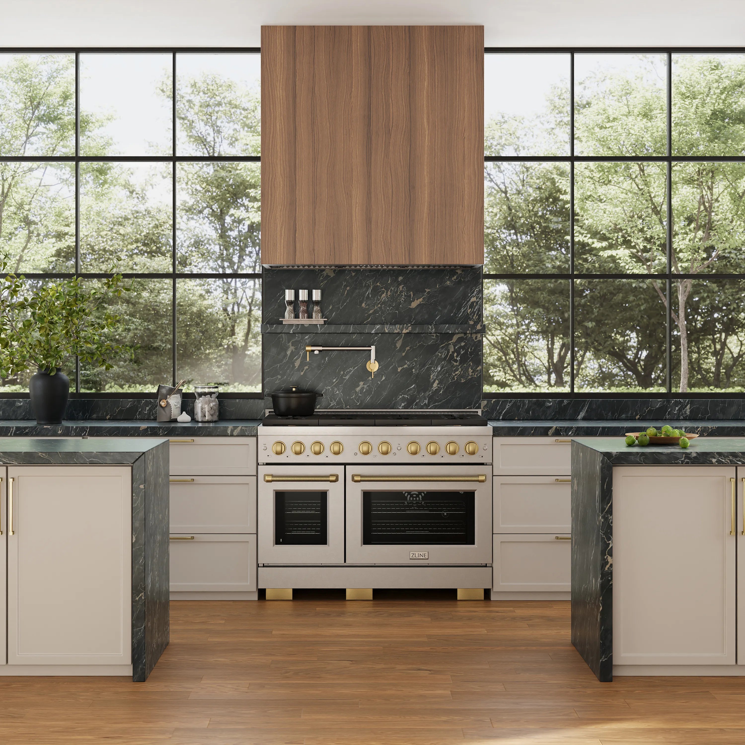 Stainless steel range hood insert centered above cooktop with decorative wood hood panel