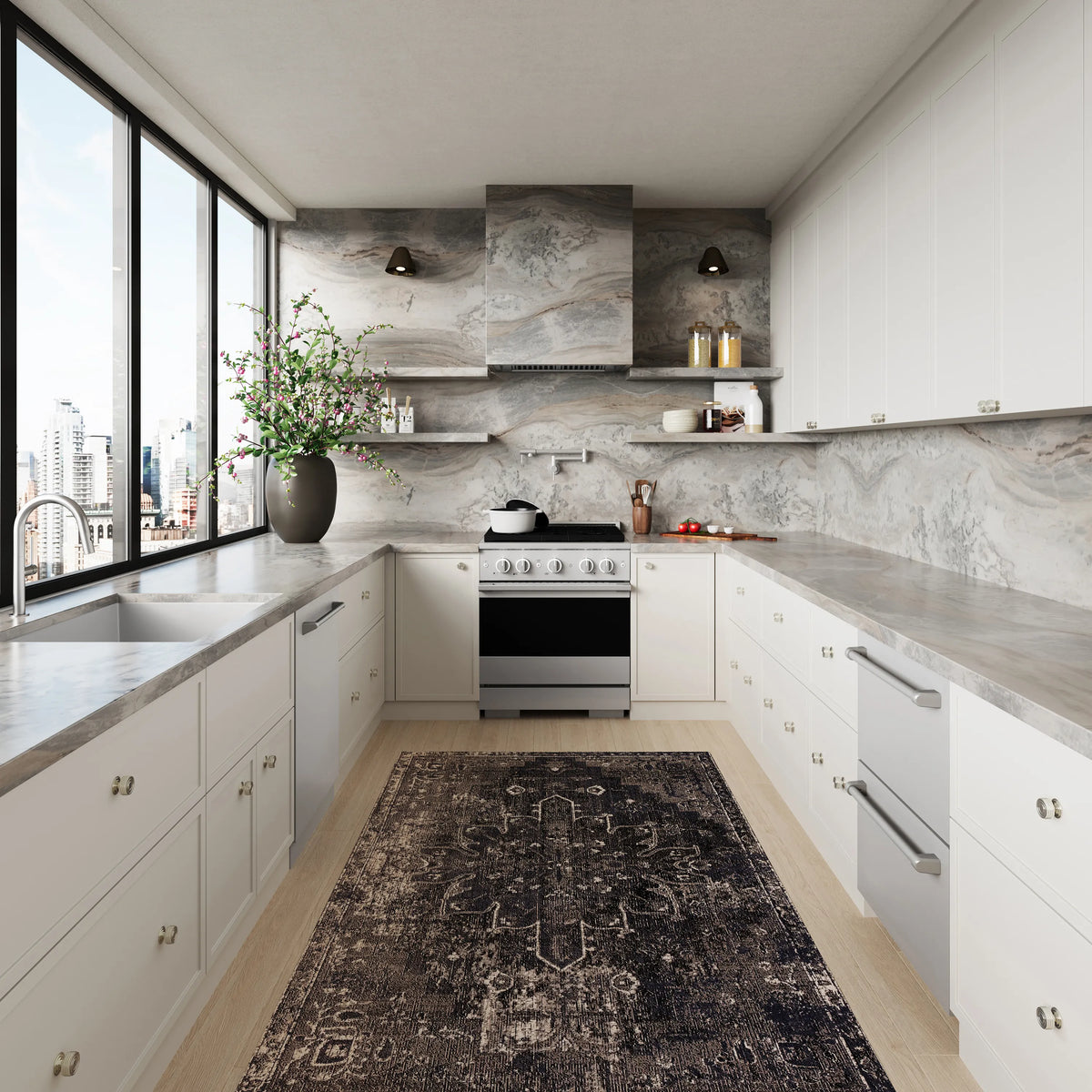 Built-in stainless dual fuel range in modern kitchen with oven door and cooktop