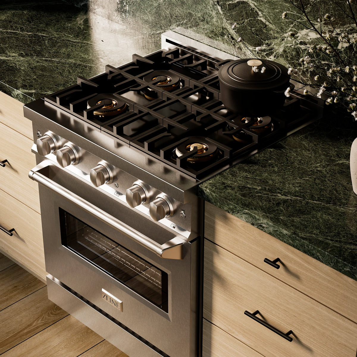 30-inch gas range with four-burner grates, control knobs, and convection oven door