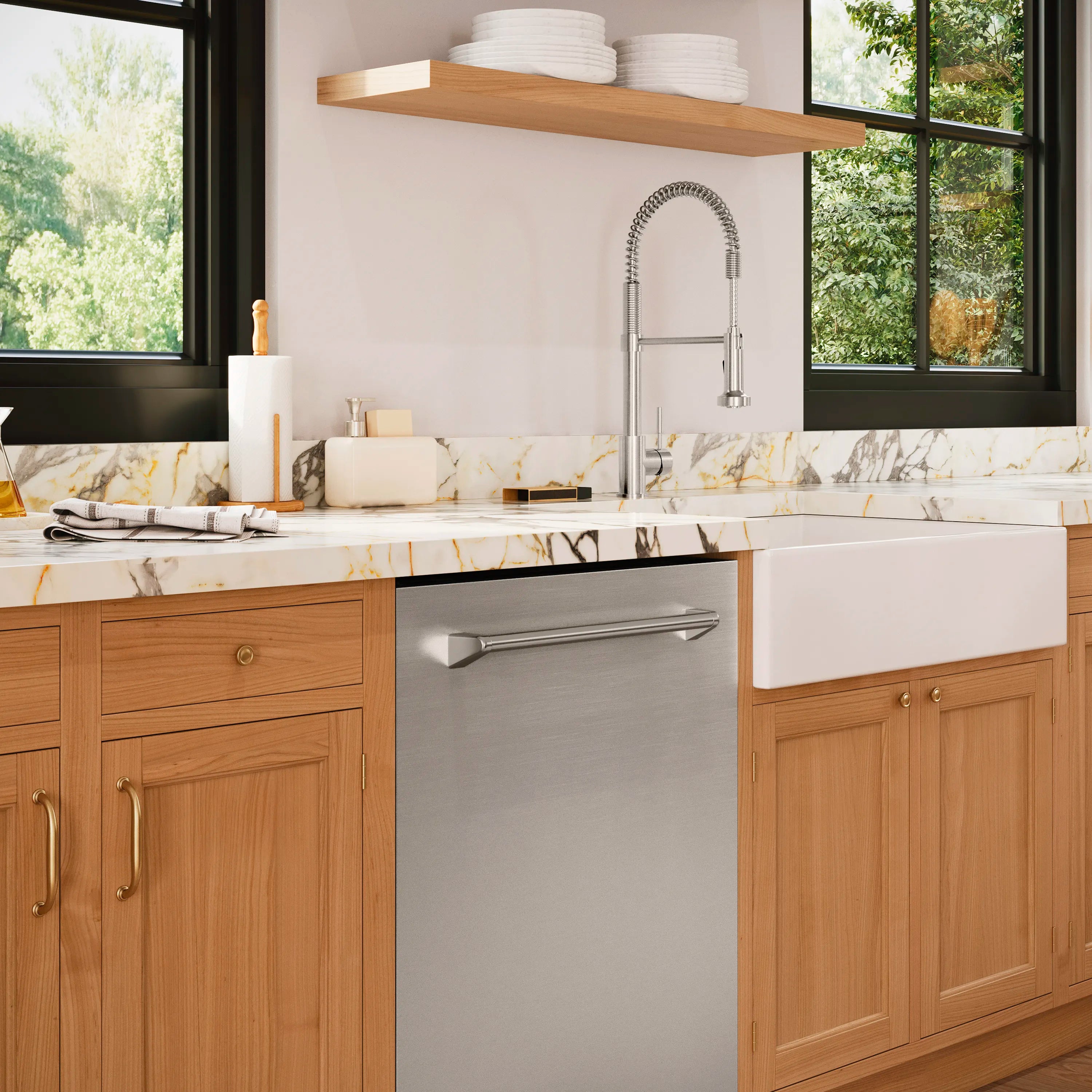 Built-in stainless steel dishwasher centered between kitchen base cabinets