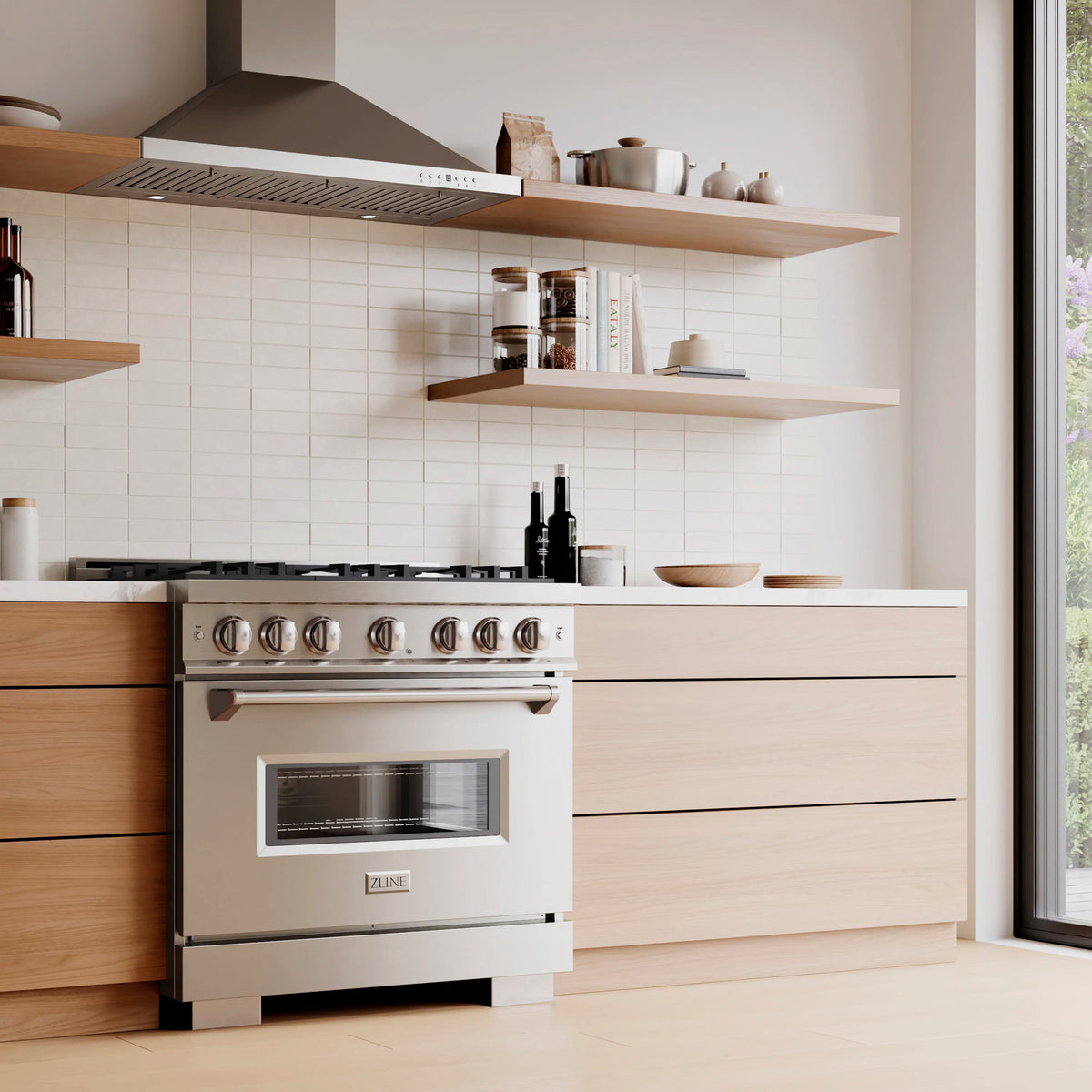 Stainless range with control panel, oven door, and centered drawer handle