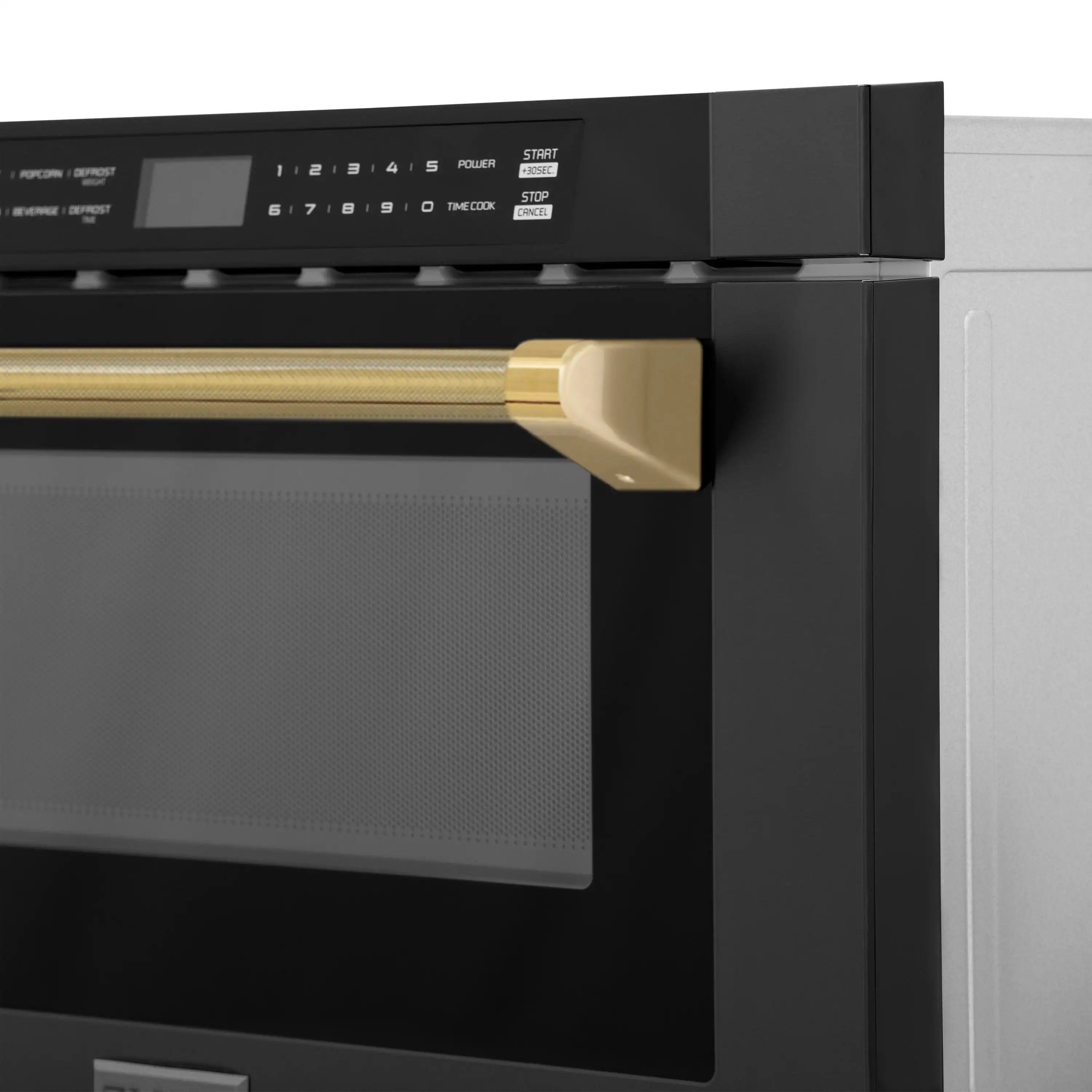 Black microwave drawer front close-up with gold handle and control panel