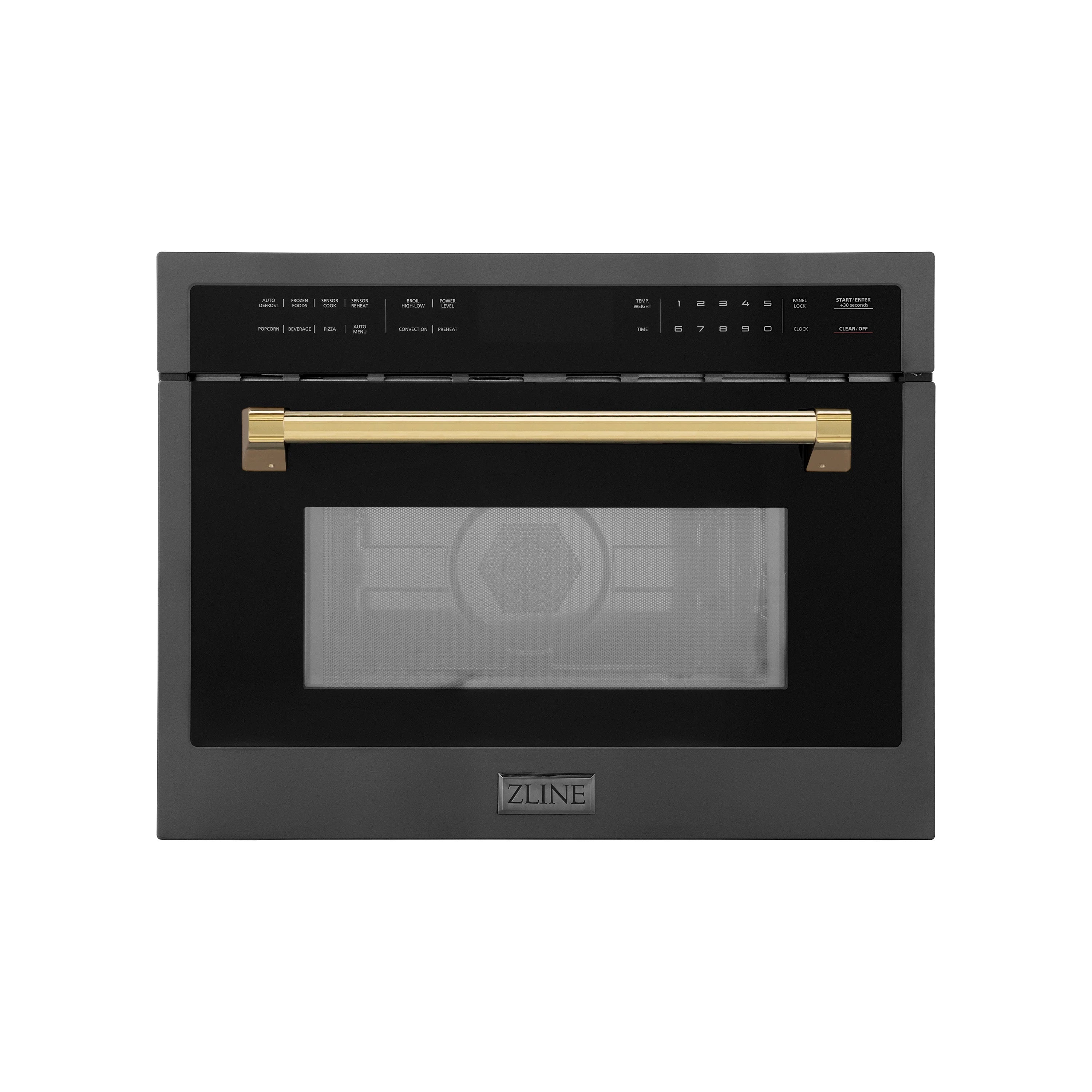 Black stainless microwave with gold bar handle and control panel above glass door