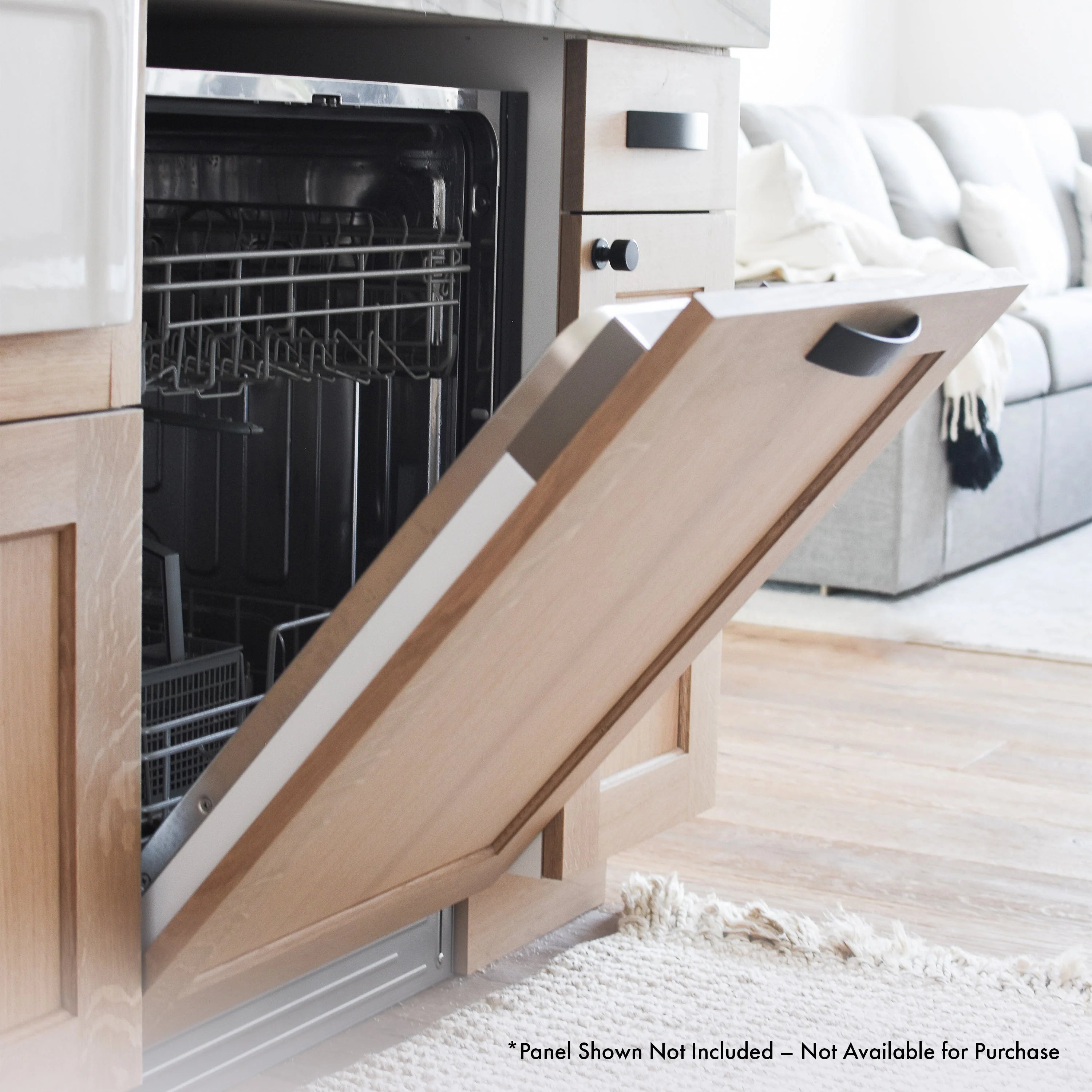 Panel-ready dishwasher with open door and included-style wooden panel frame