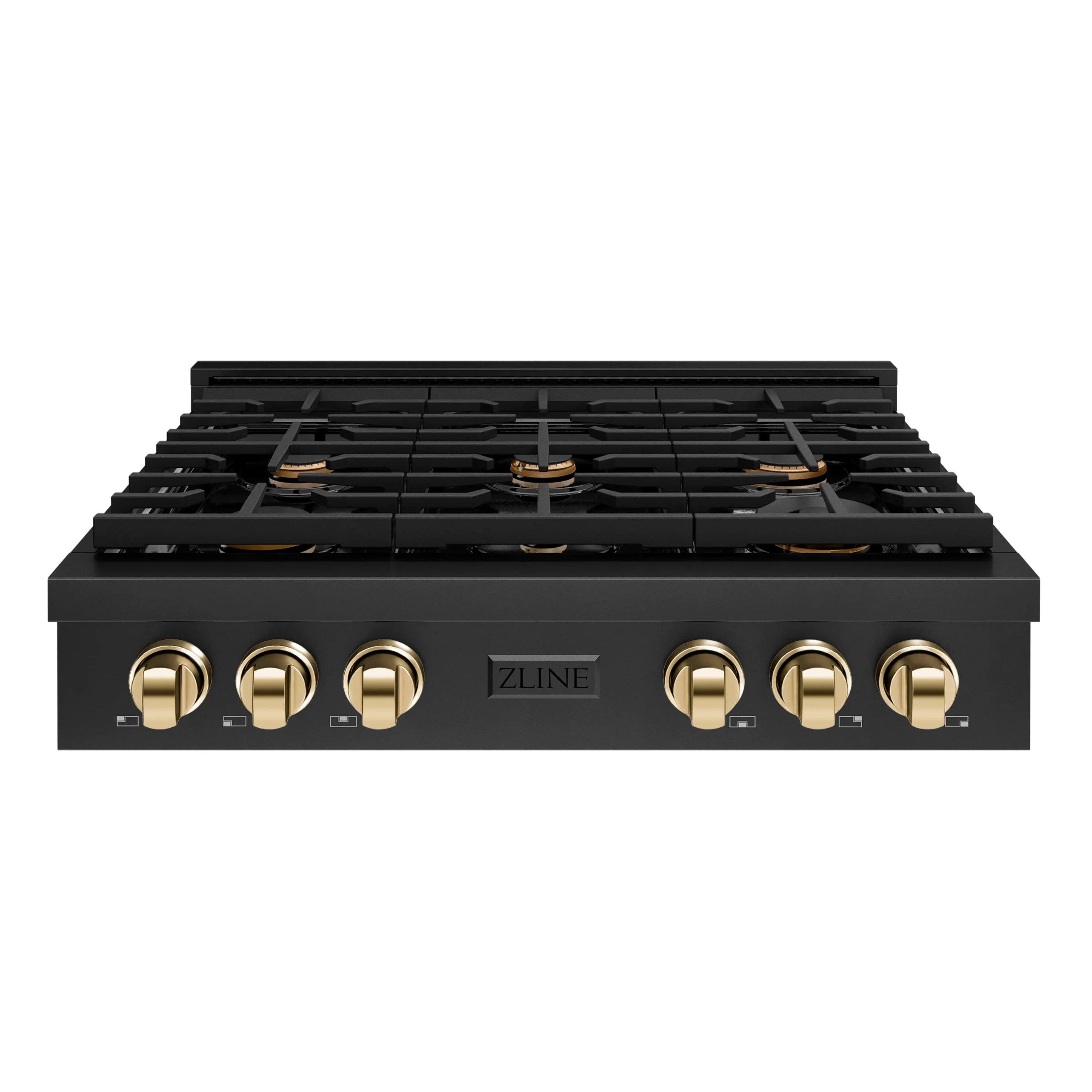 Gas rangetop front panel with six burner grates and polished gold control knobs on black