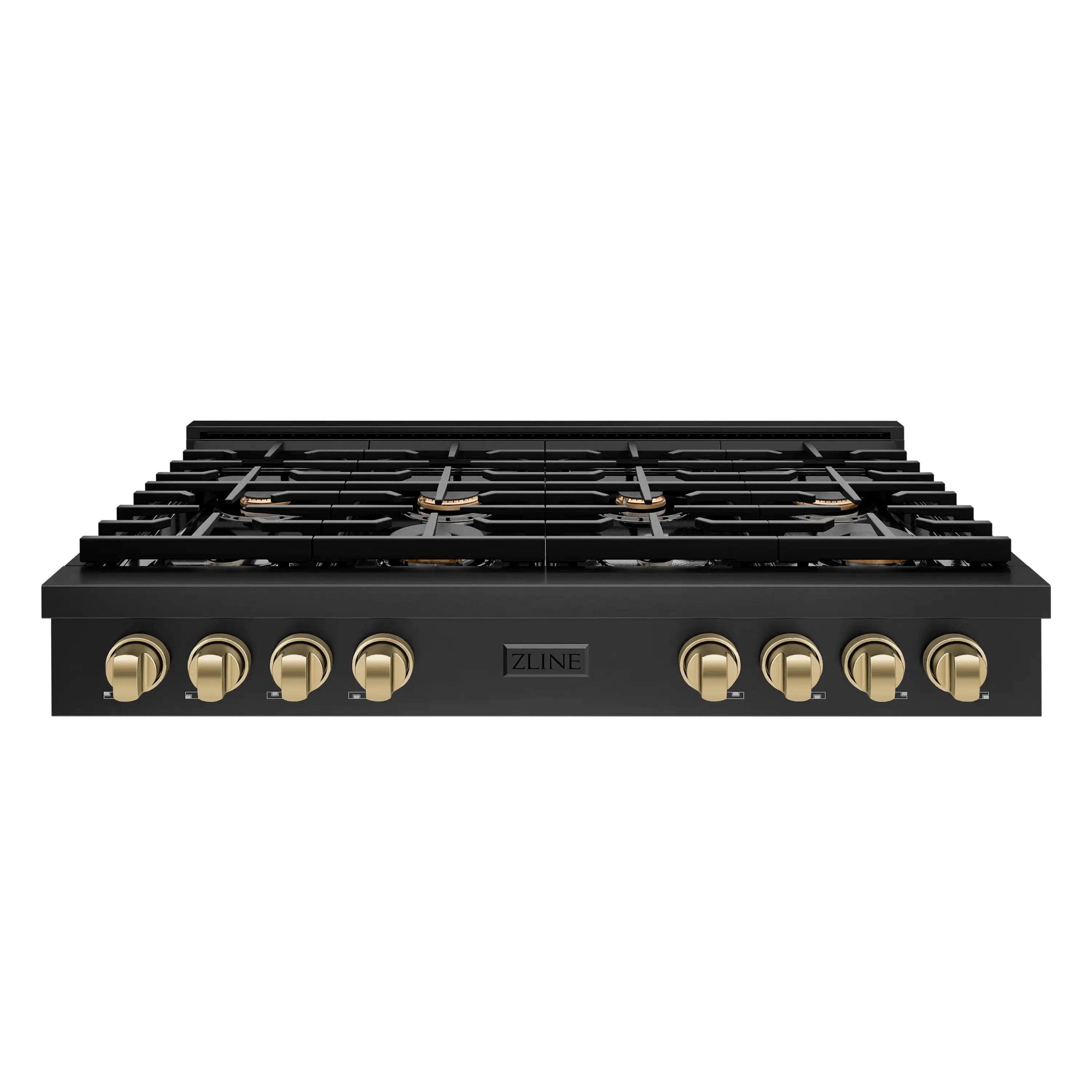 Front view of black gas rangetop with grates and champagne bronze control knobs