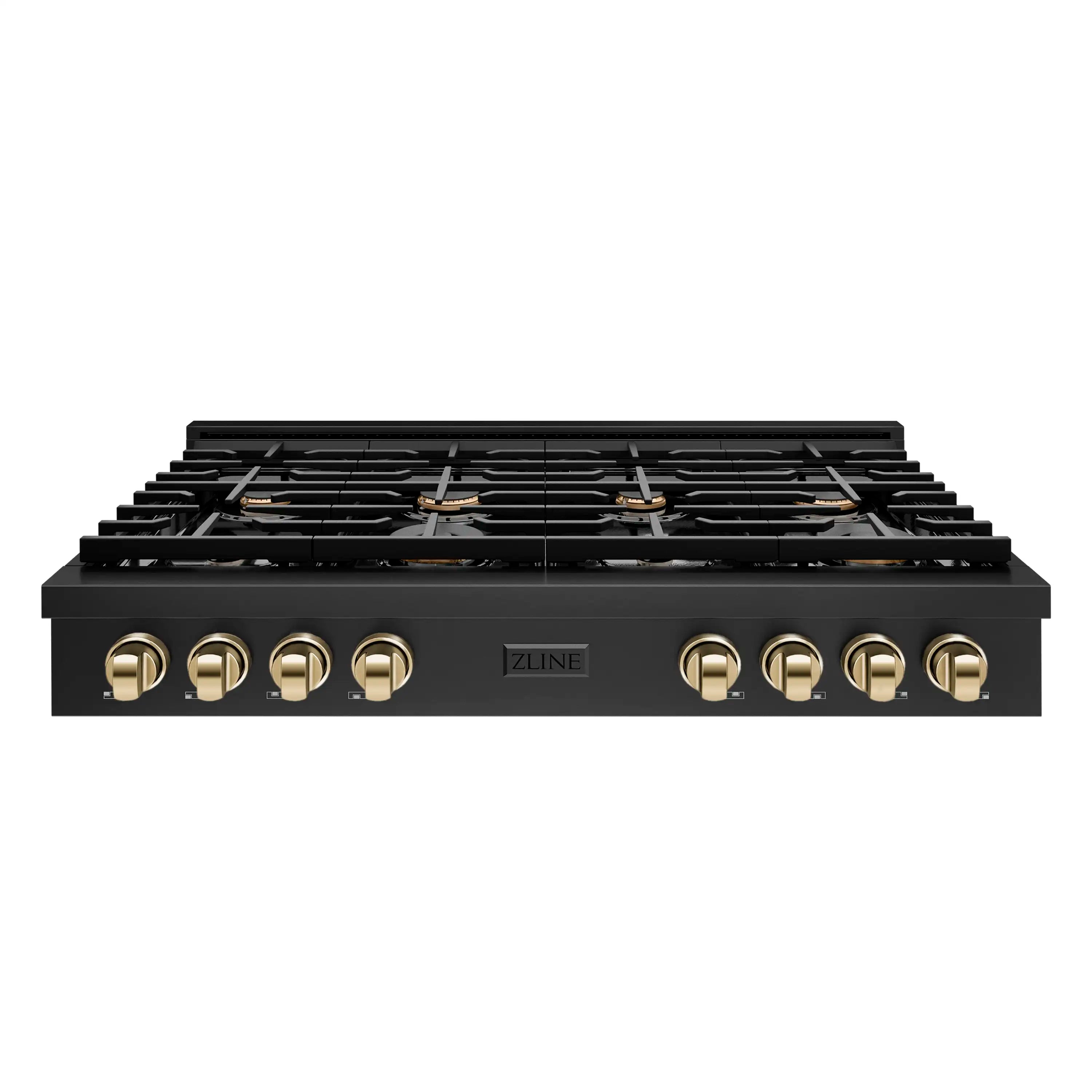 Black gas cooktop front panel with polished gold control knobs and black burner grates