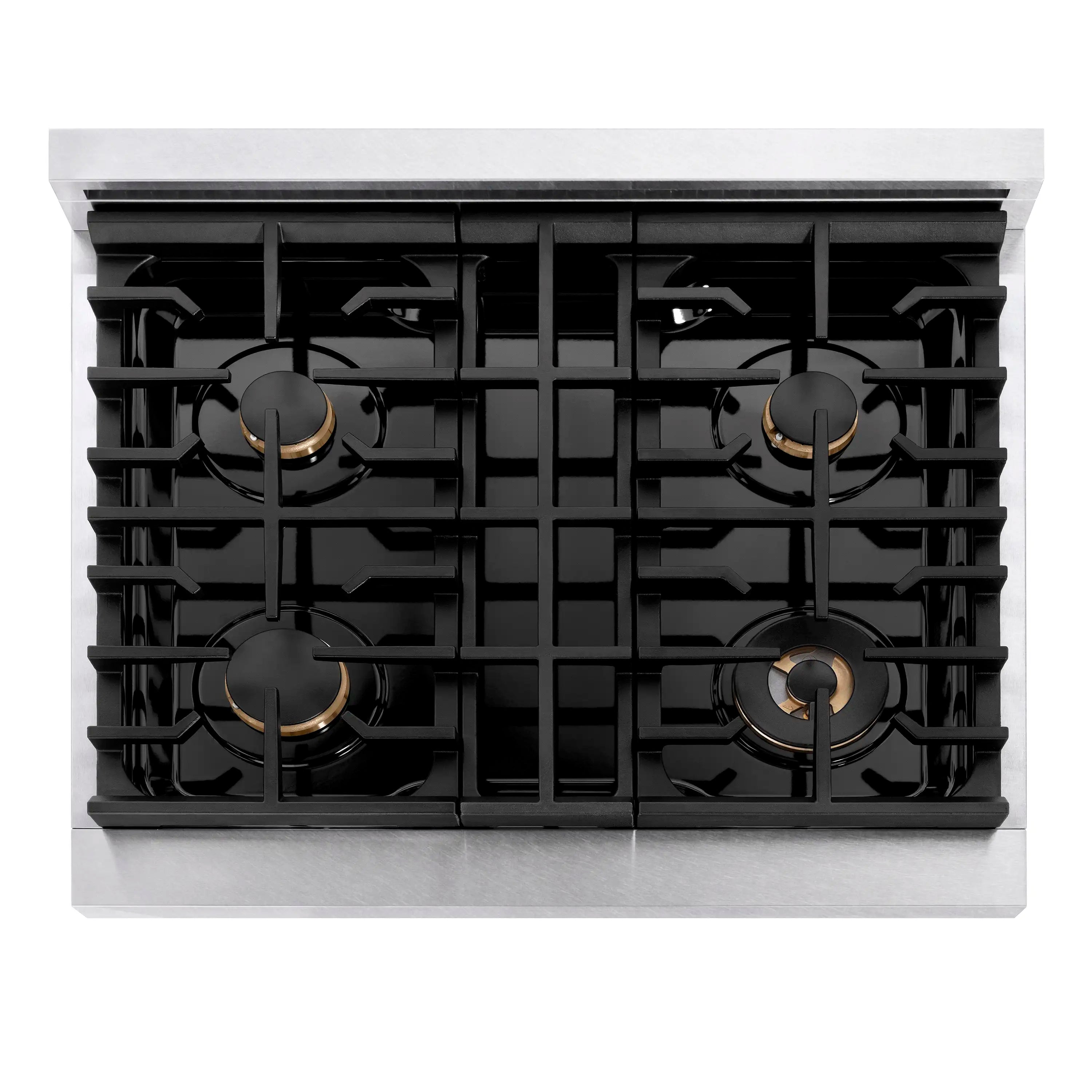 Top view of four burners with black cast grates and gold ring accents