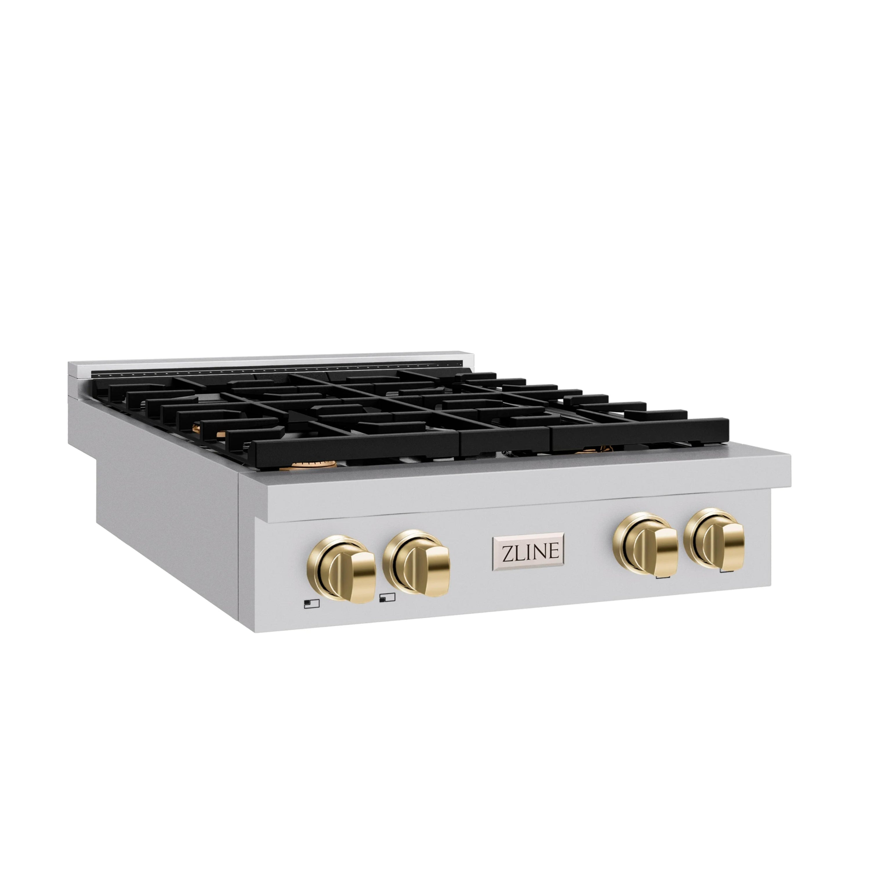 Stainless gas rangetop front with four burners, black grates, and polished gold knobs