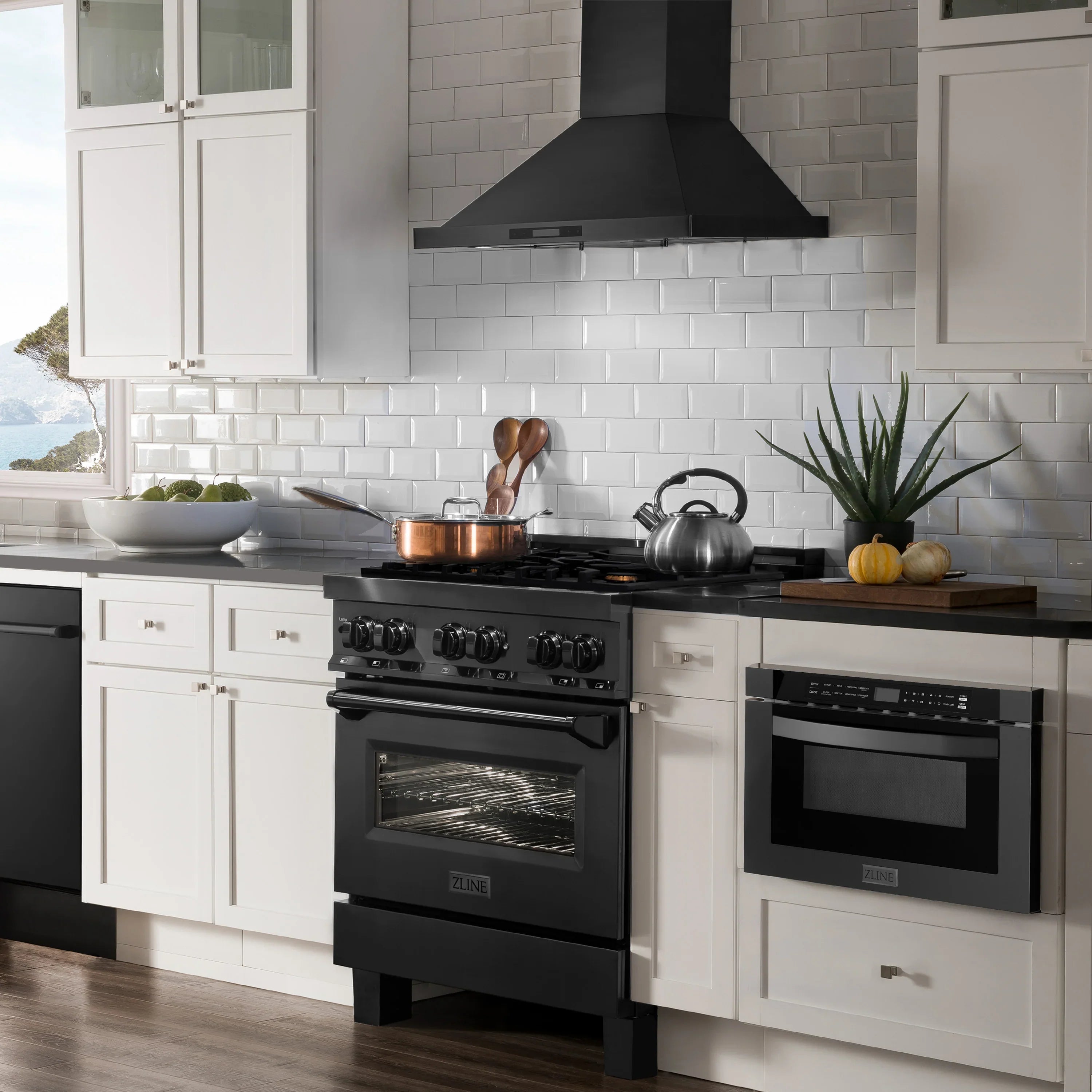 4-piece black stainless appliance set: dual fuel range, fridge, microwave drawer, dishwasher