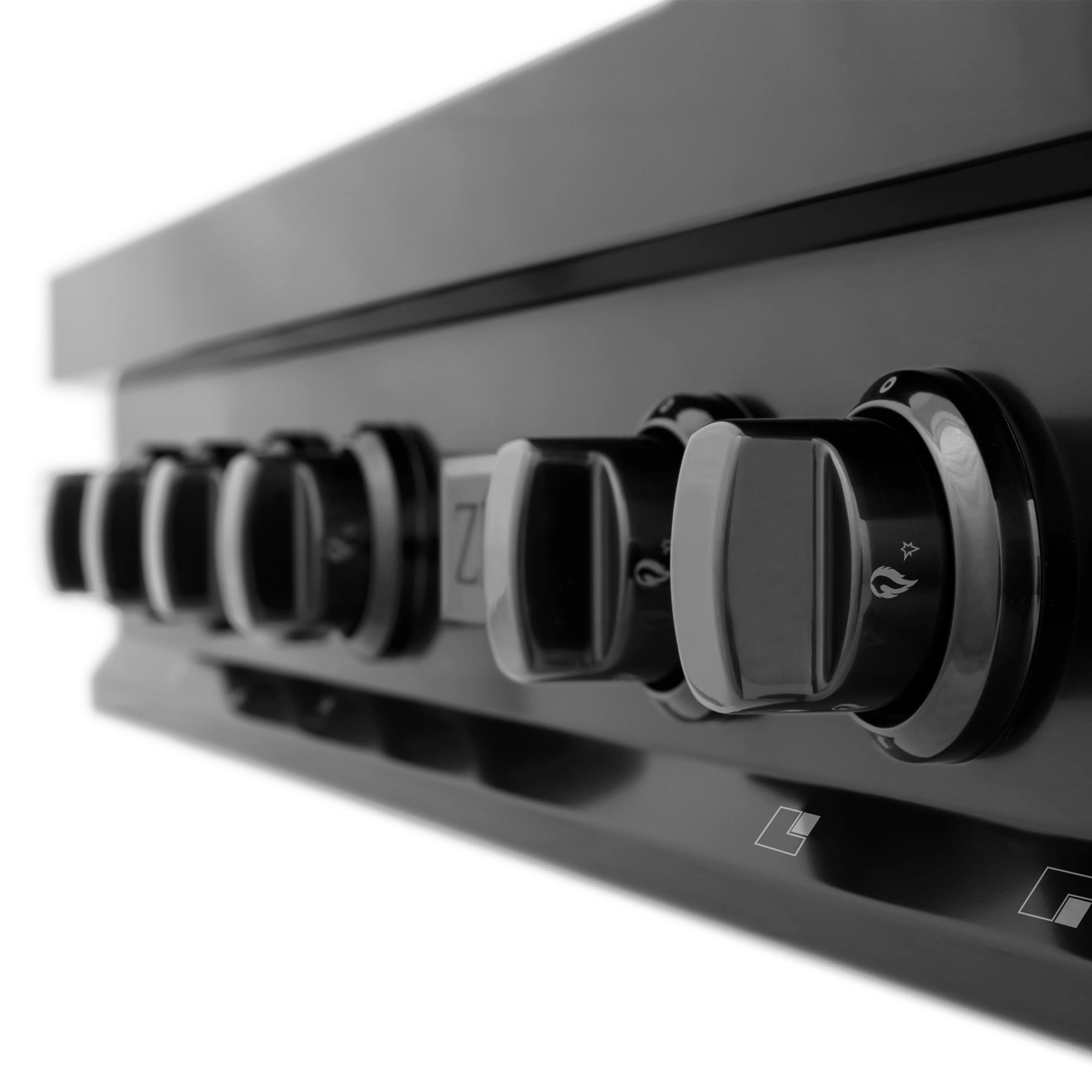 Close-up side view of black gas rangetop showing control knobs along the front edge
