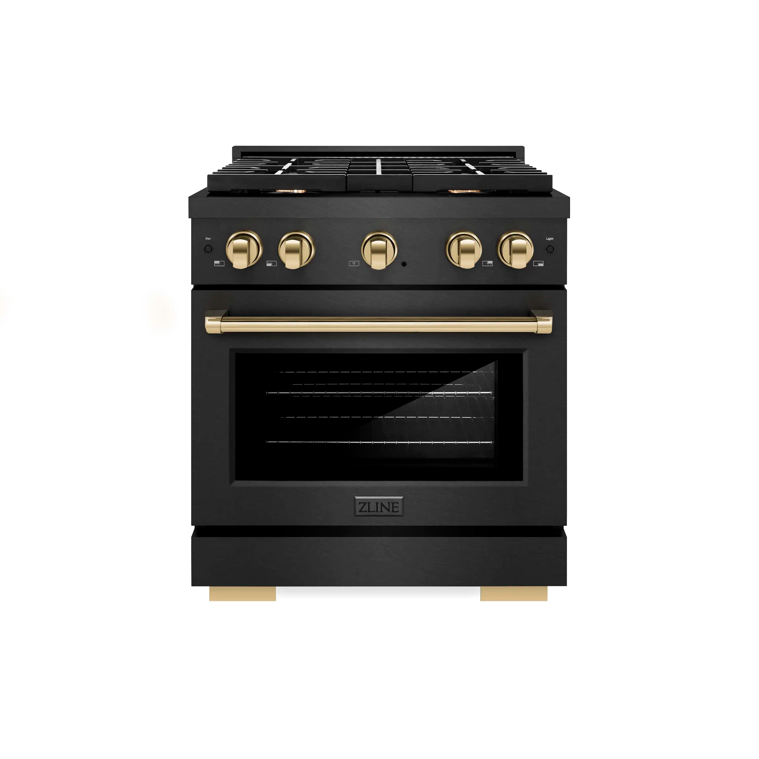 Black dual fuel range front with four gold knobs and burner grates