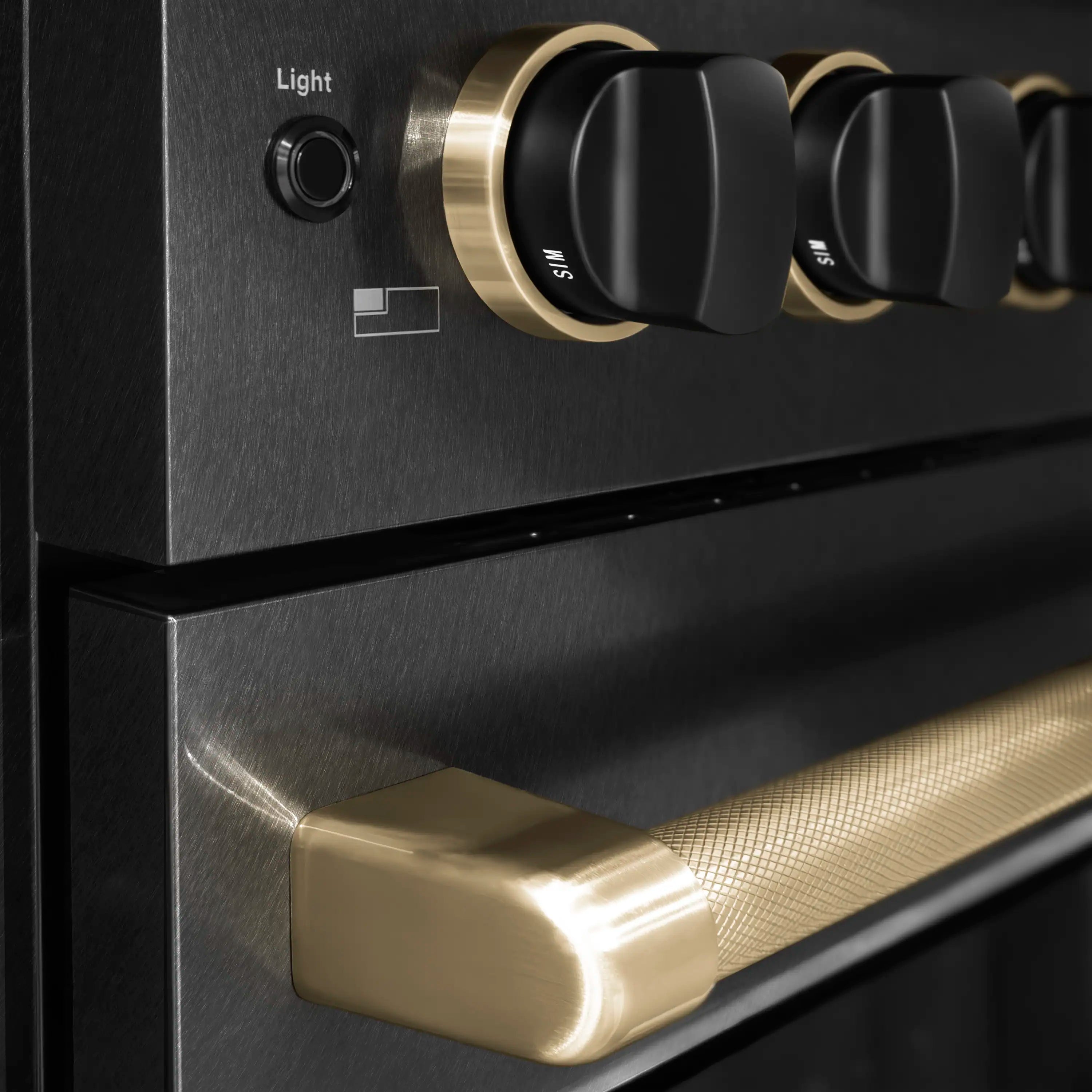 Black control panel with champagne bronze rotary knobs, including a Light button