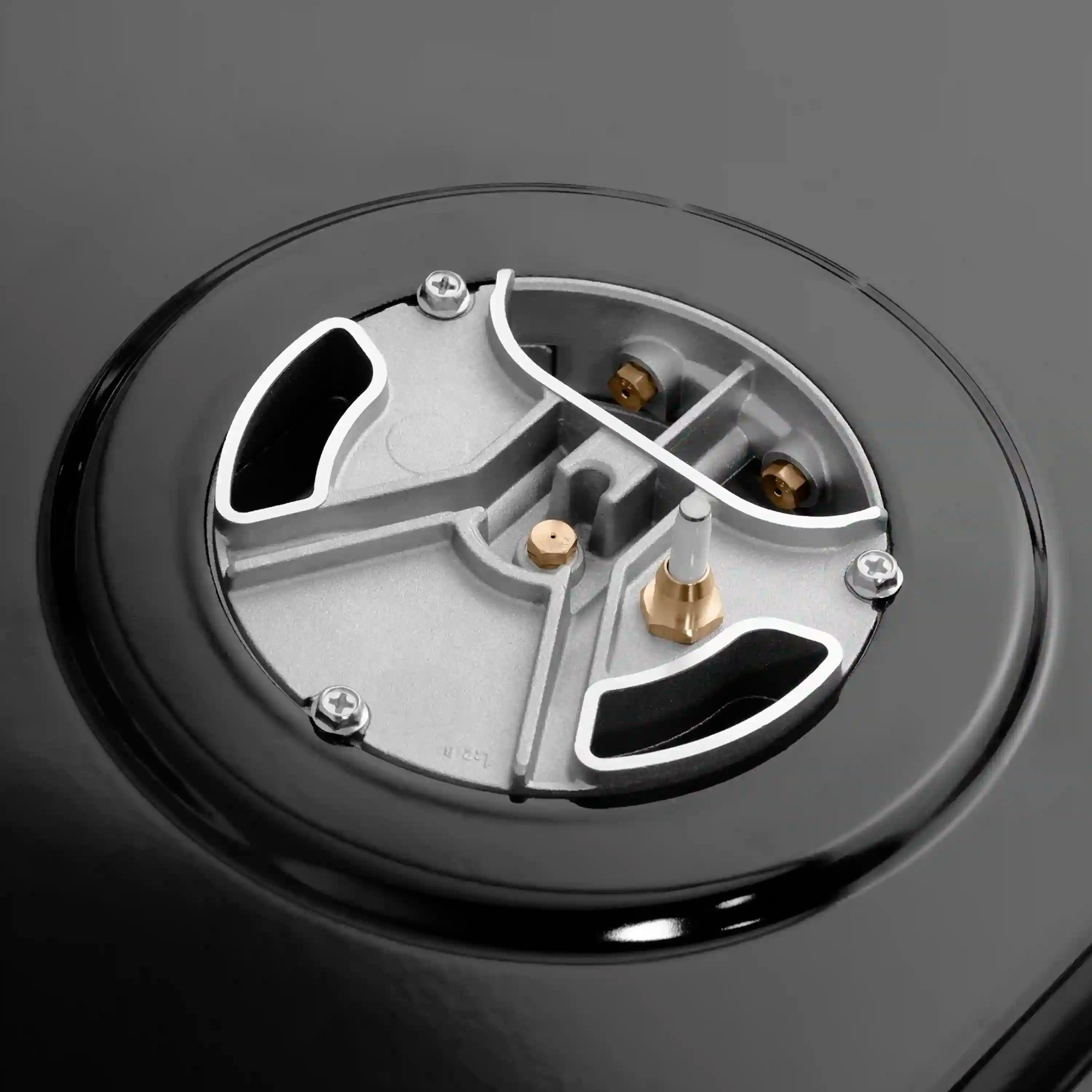Gas burner head assembly with black base and brass-gold burner cap