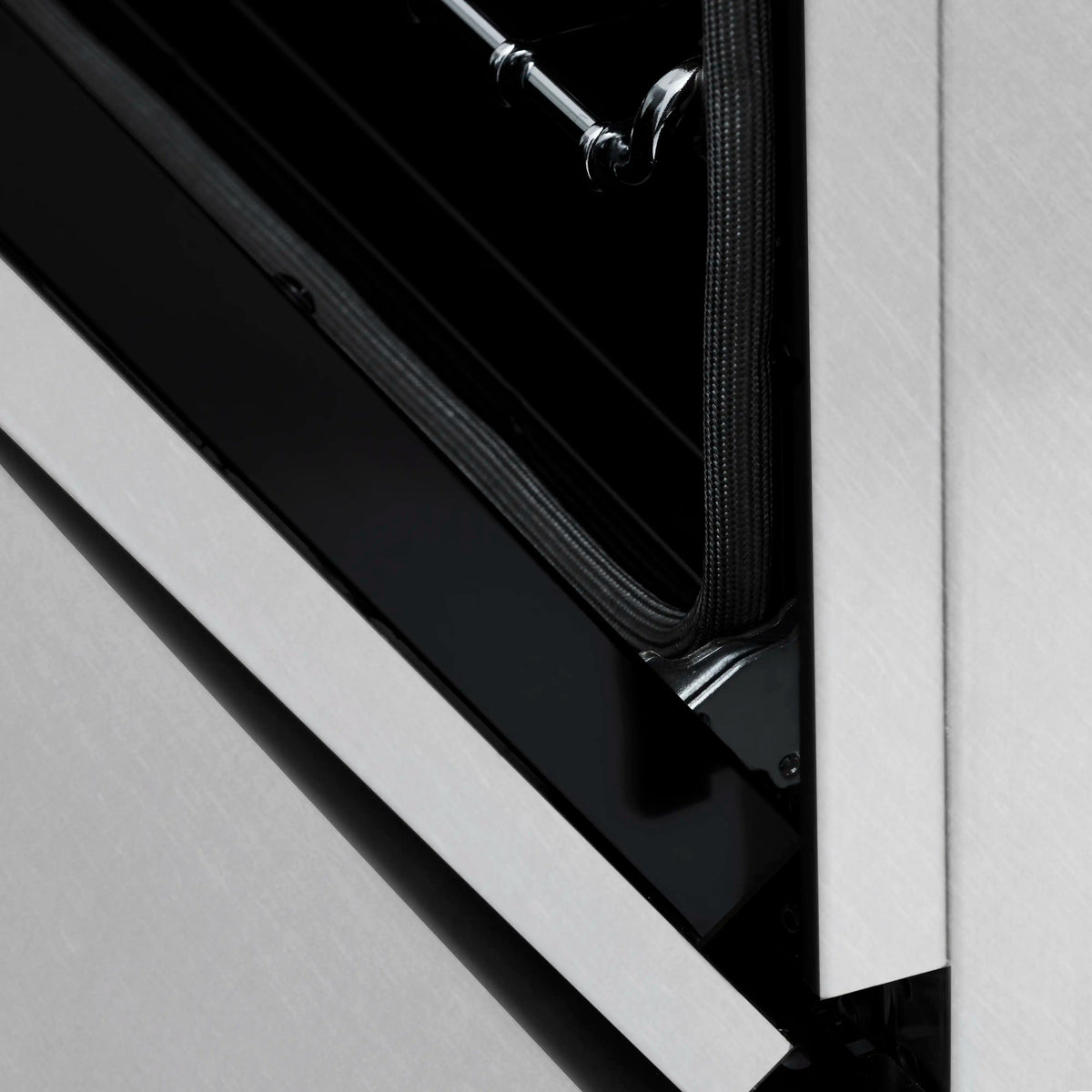 Lower oven door with black glass panel and stainless trim edge