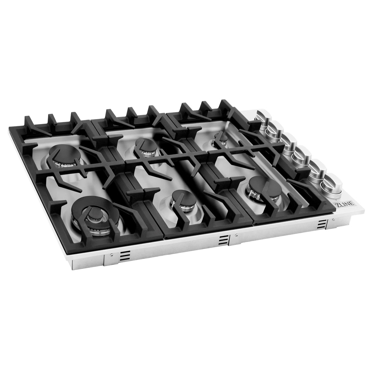 Gas cooktop viewed at an angle showing six black grates and stainless edges