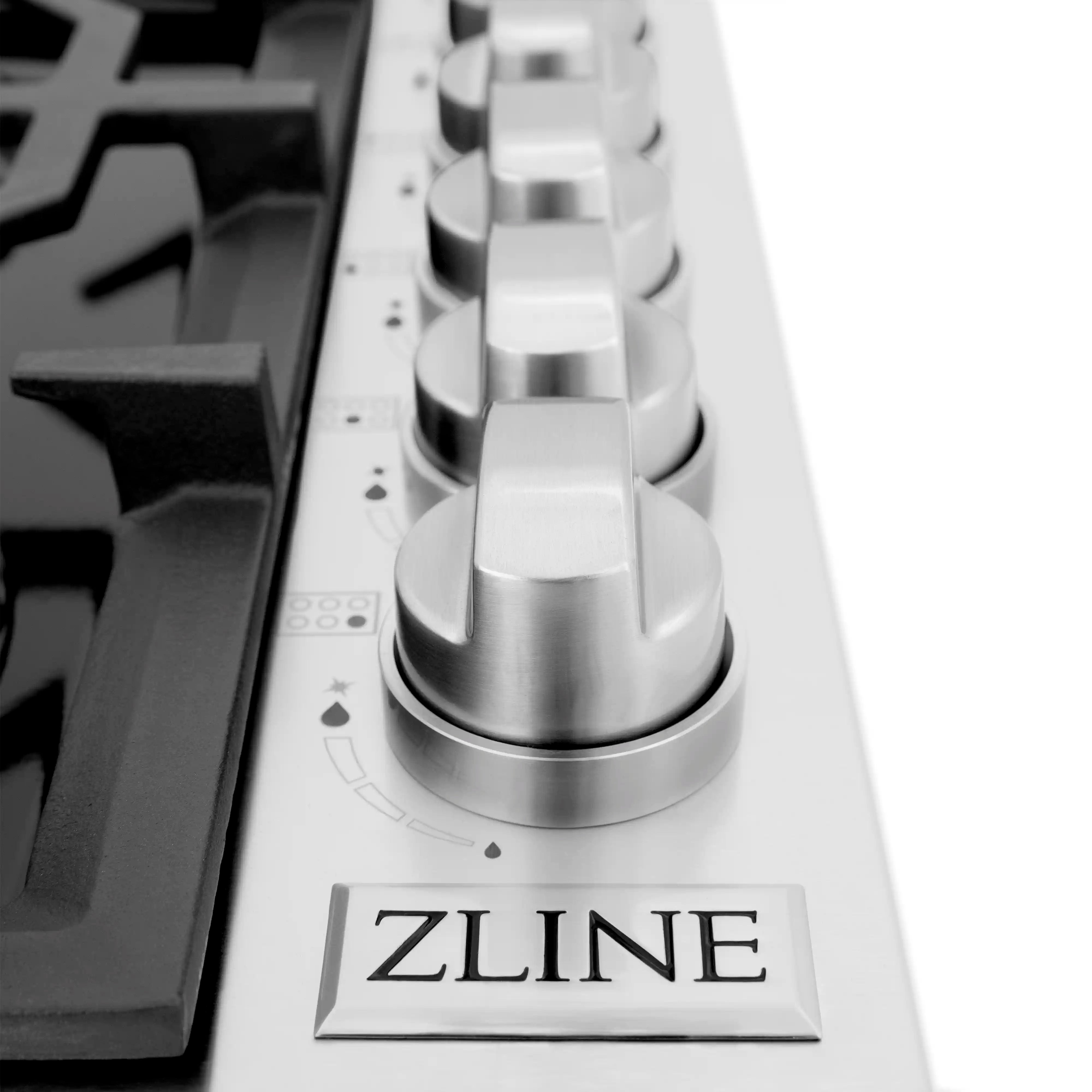 ZLINE control knob next to burner and grates on black gas cooktop