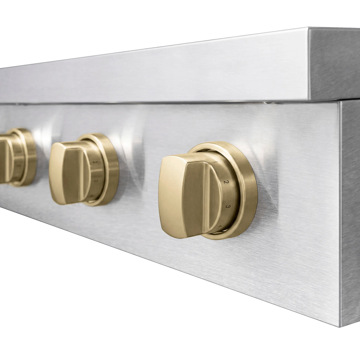 Satin stainless induction cooktop edge with champagne bronze rotary control knob set