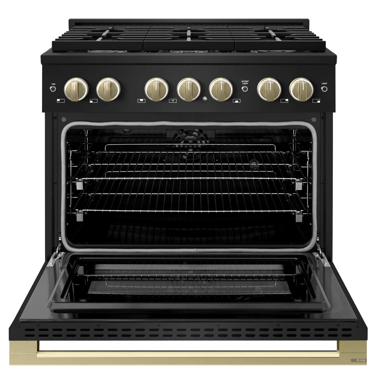 Black range with oven door open, wire racks inside, and champagne bronze control knobs