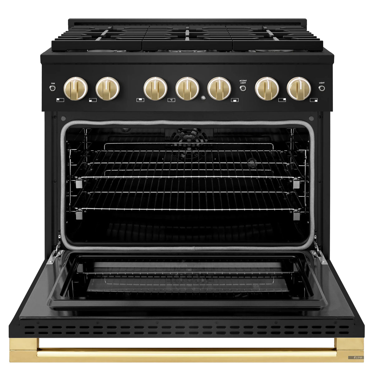 Black stainless dual fuel range with open electric convection oven and gold control knobs